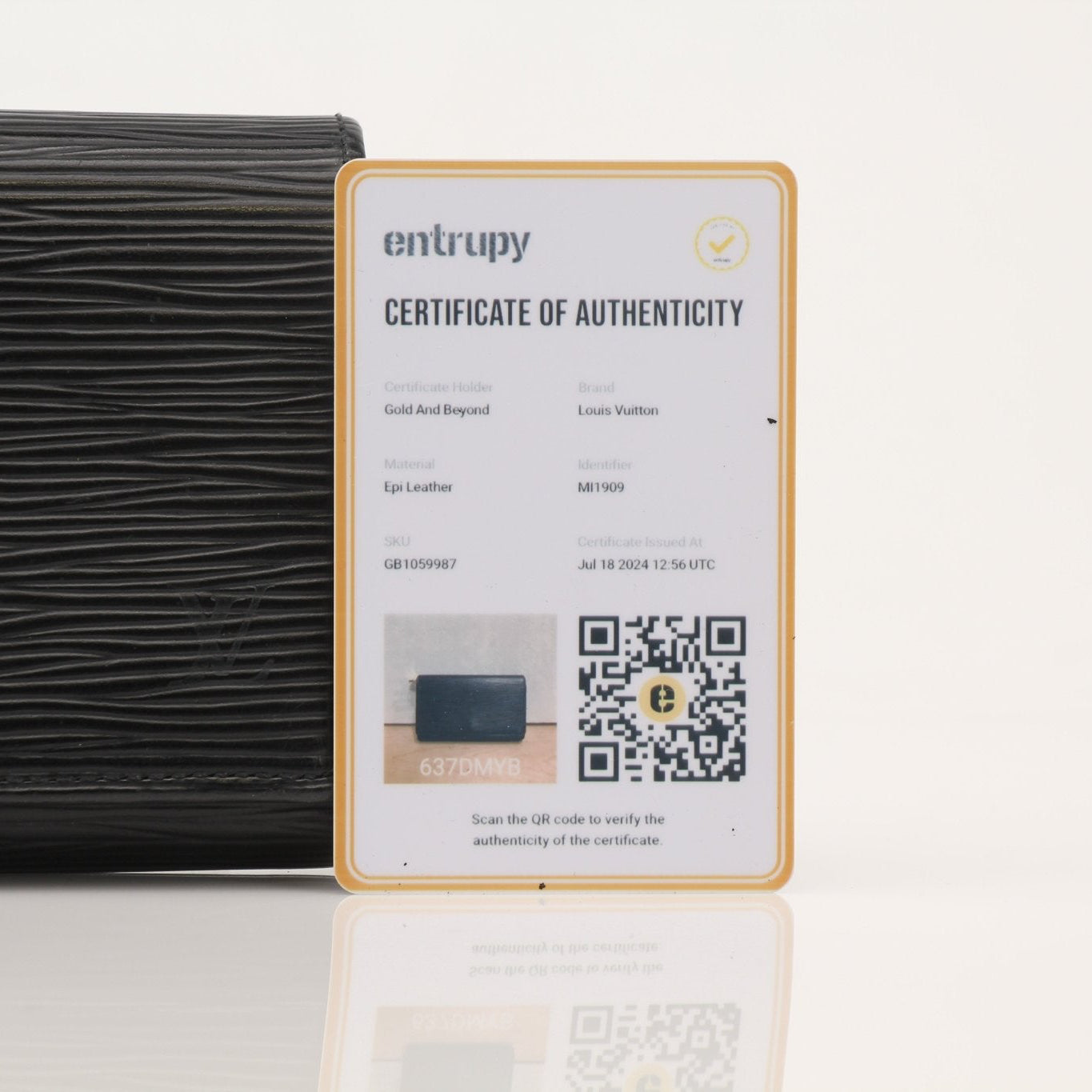 Louis Vuitton Epi Ebene wallet by Gold & Beyond, featuring textured leather and multiple card slots.