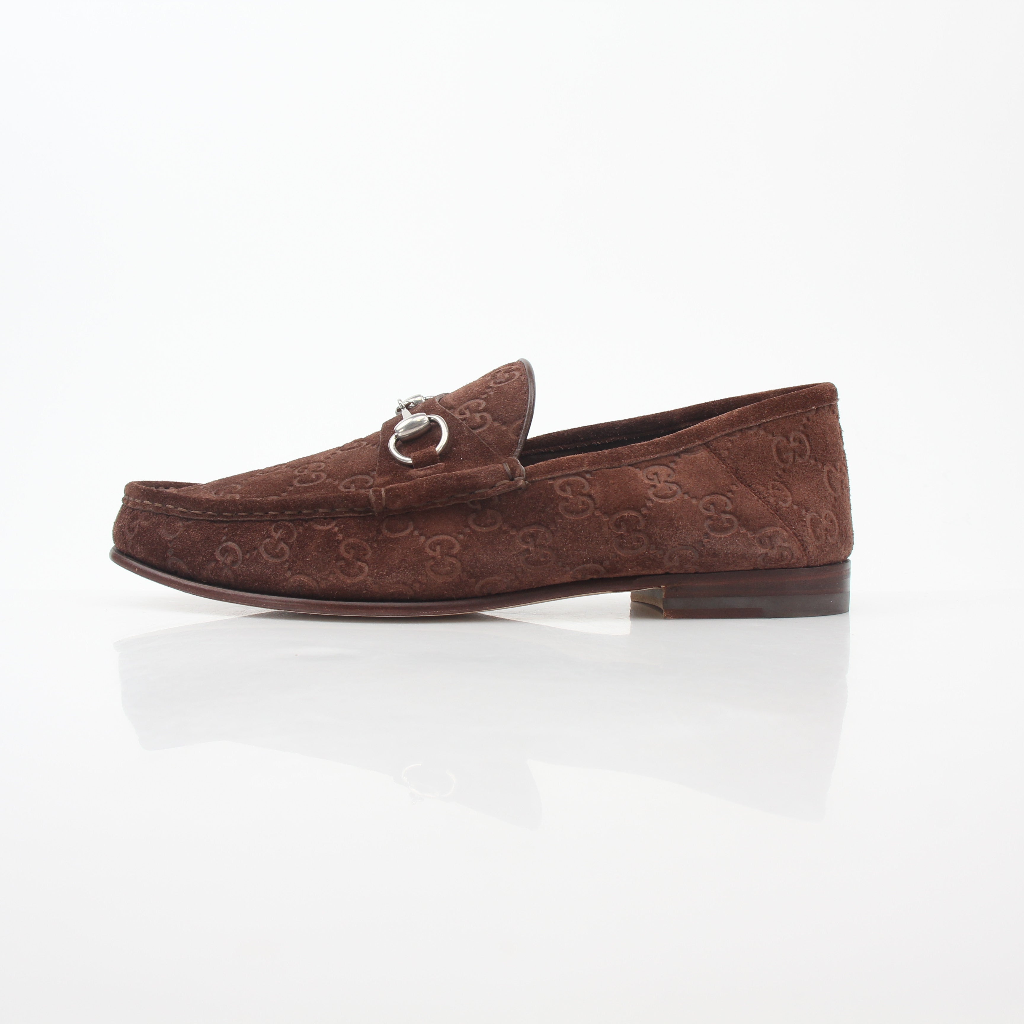 Gucci Brown GG Suede Horsebit 1953 Loafers, stylish men's shoes with gold horsebit detail, made from soft suede material.