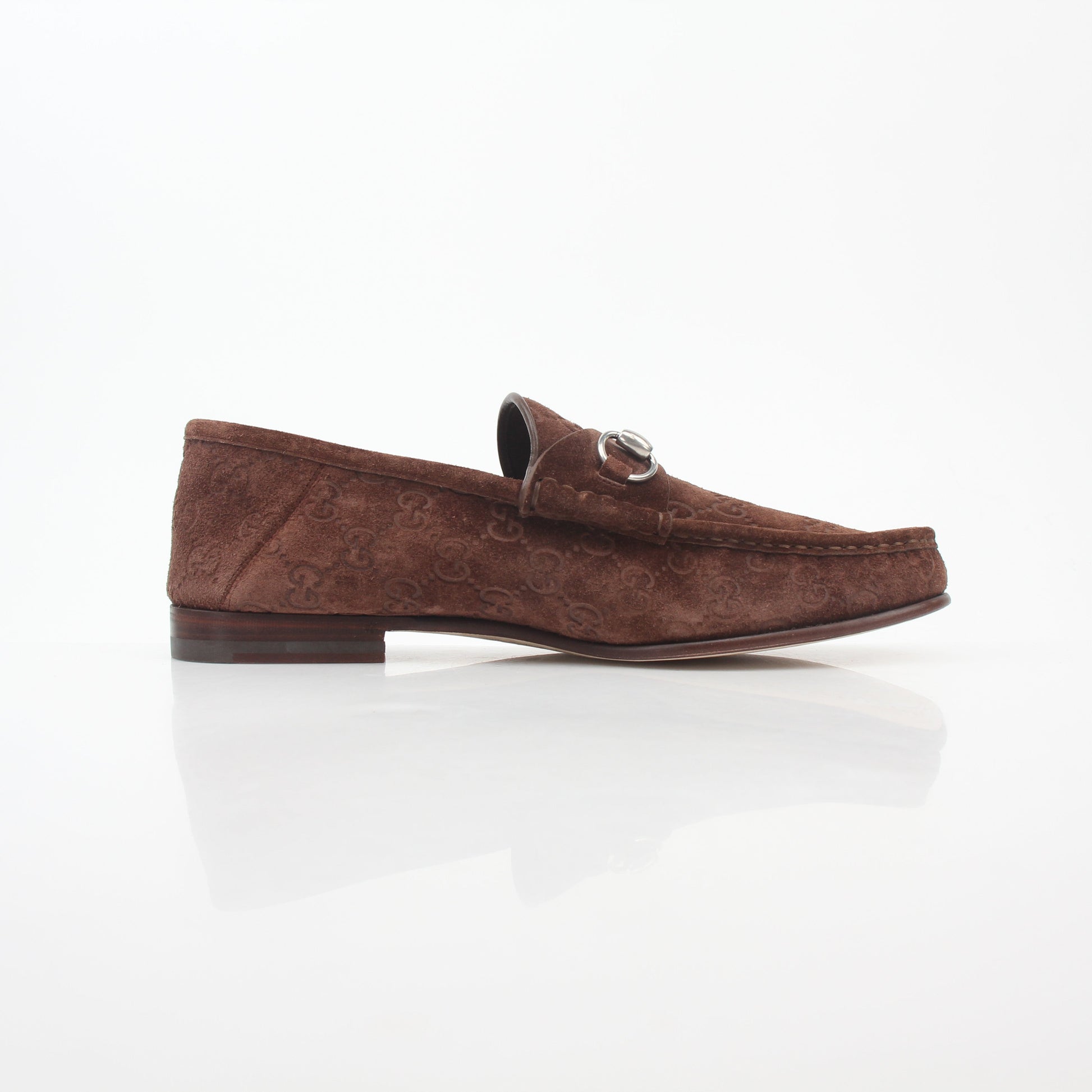 Gucci brown GG suede Horsebit 1953 loafers for men, featuring classic design and gold hardware accents.