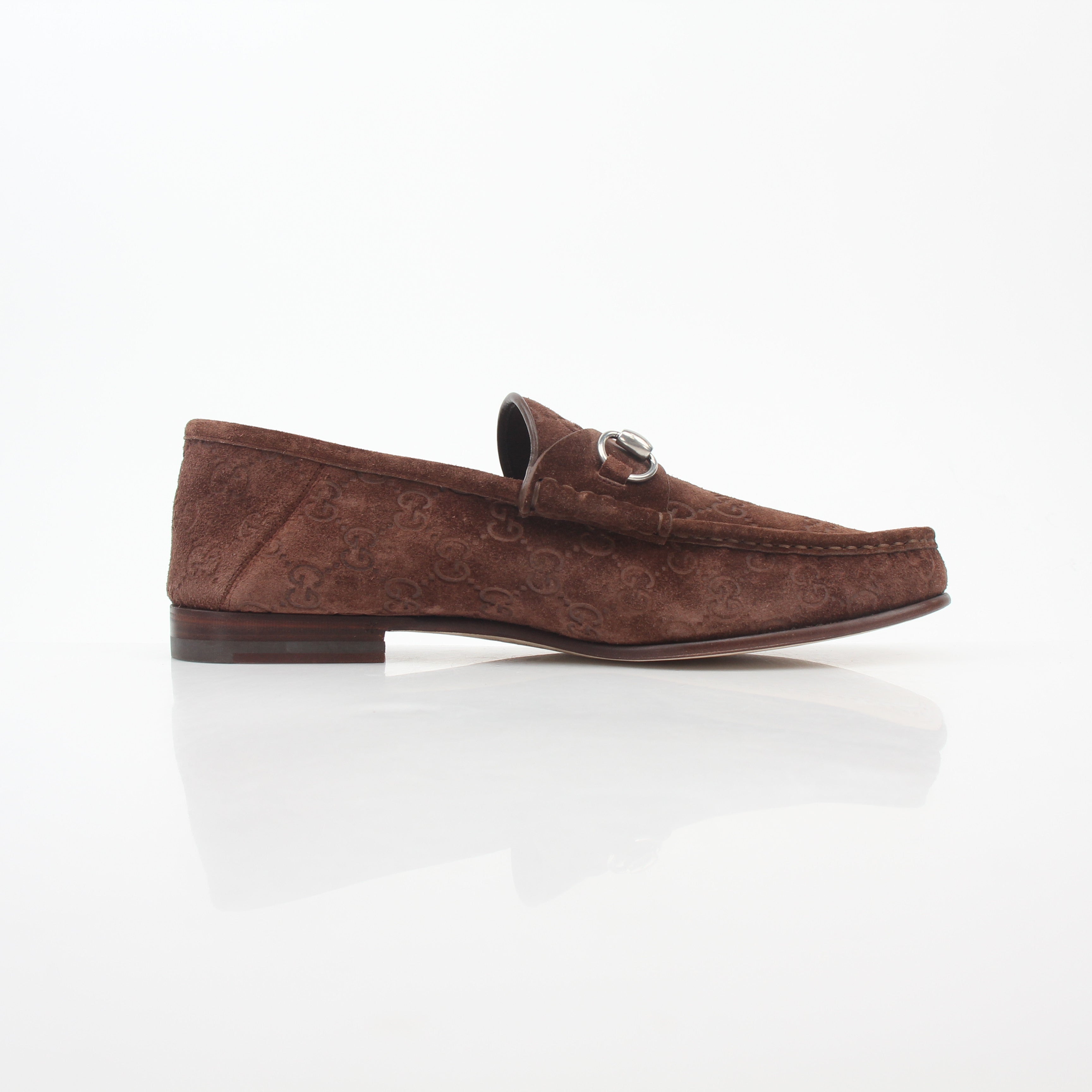 Gucci brown GG suede Horsebit 1953 loafers for men, featuring classic design and gold hardware accents.