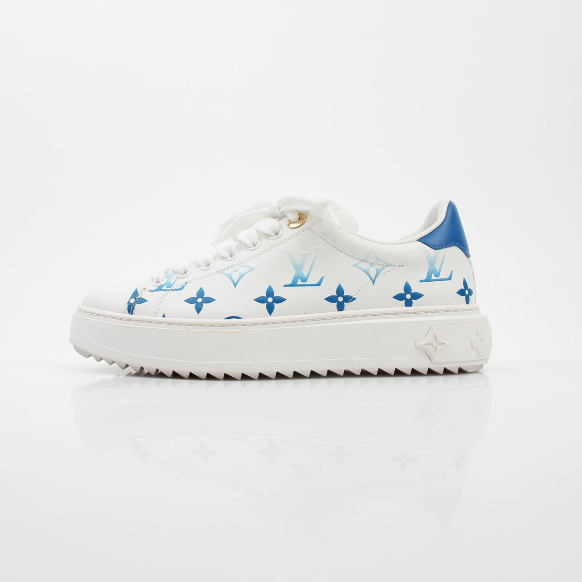 Louis Vuitton white and blue monogram Time Out sneakers, stylish shoes with LV pattern and sporty design by Gold & Beyond.