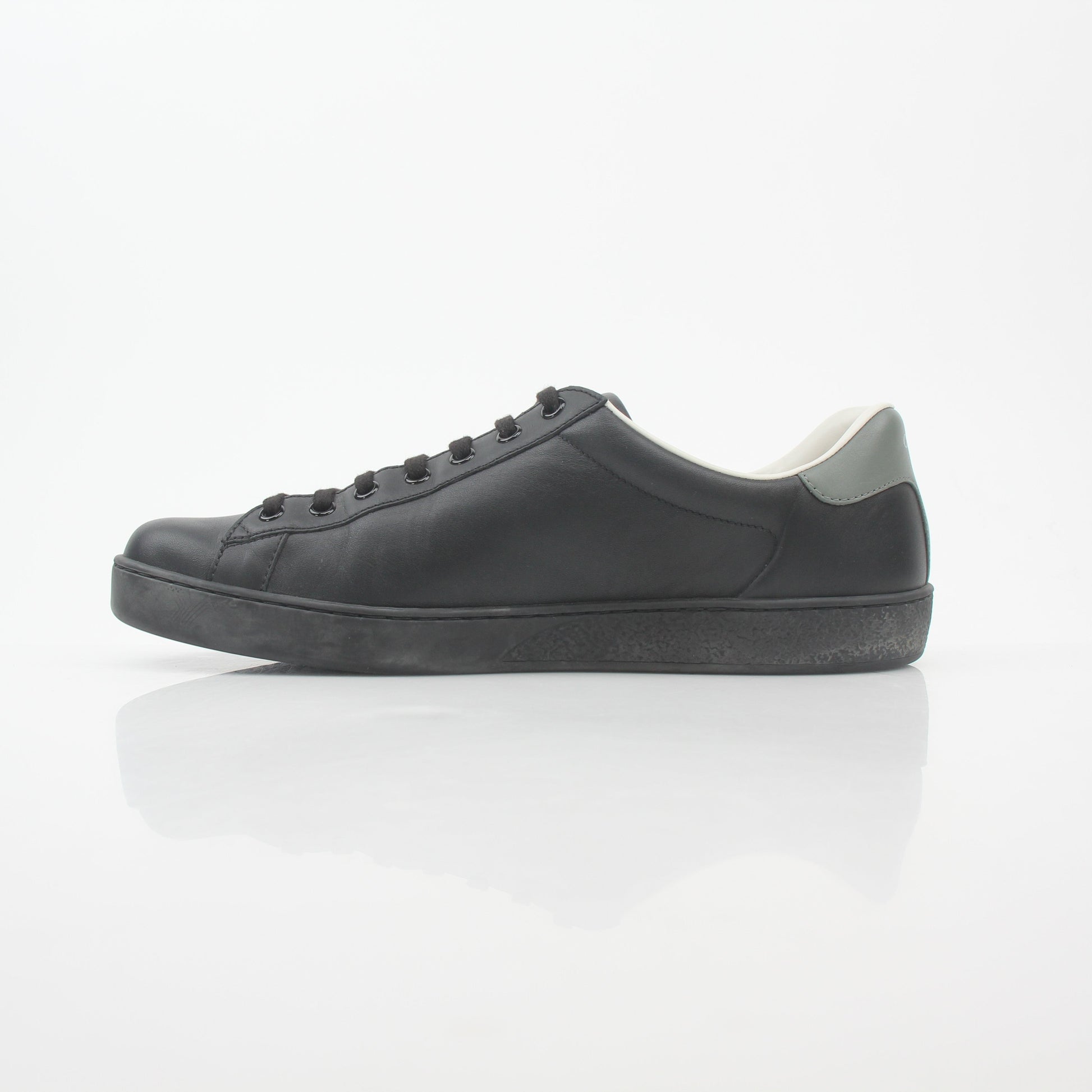 Gucci Black Leather Brooklyn Low-Top Sneakers, stylish shoes with sleek leather design and classic laces, from Gold & Beyond.
