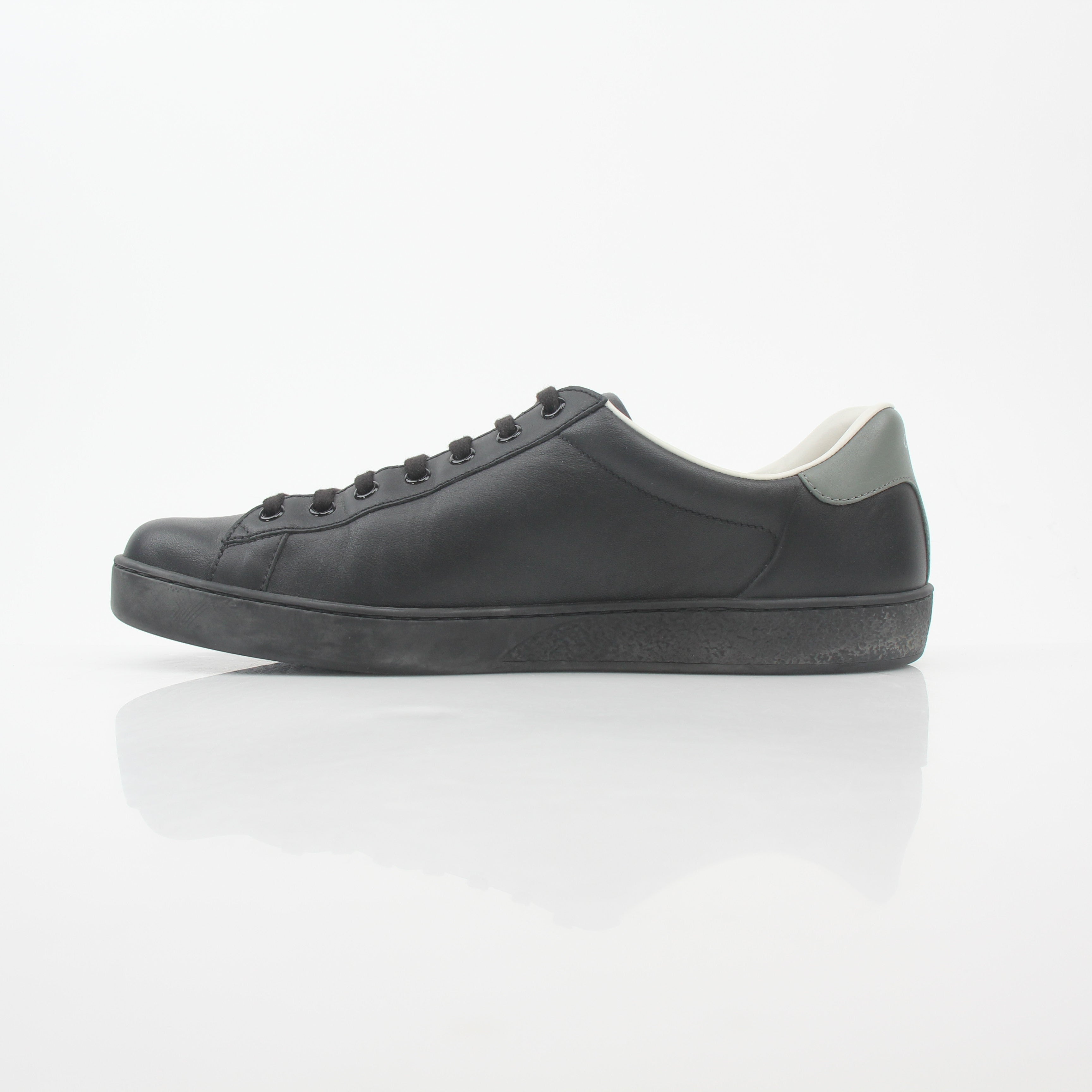 Gucci Black Leather Brooklyn Low-Top Sneakers, stylish shoes with sleek leather design and classic laces, from Gold & Beyond.