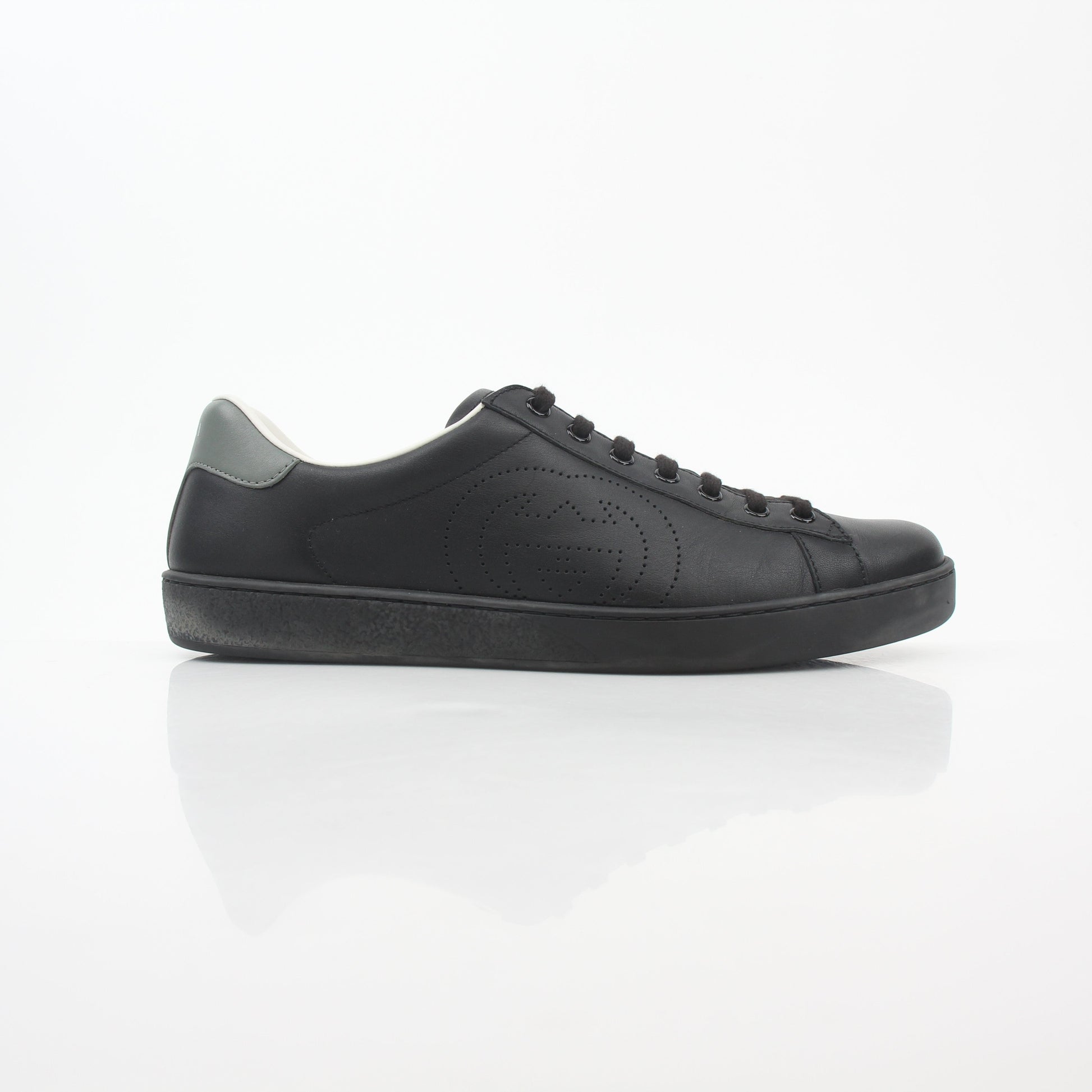 Gucci black leather Brooklyn low-top sneakers with white sole, casual shoes for men by Gold & Beyond.