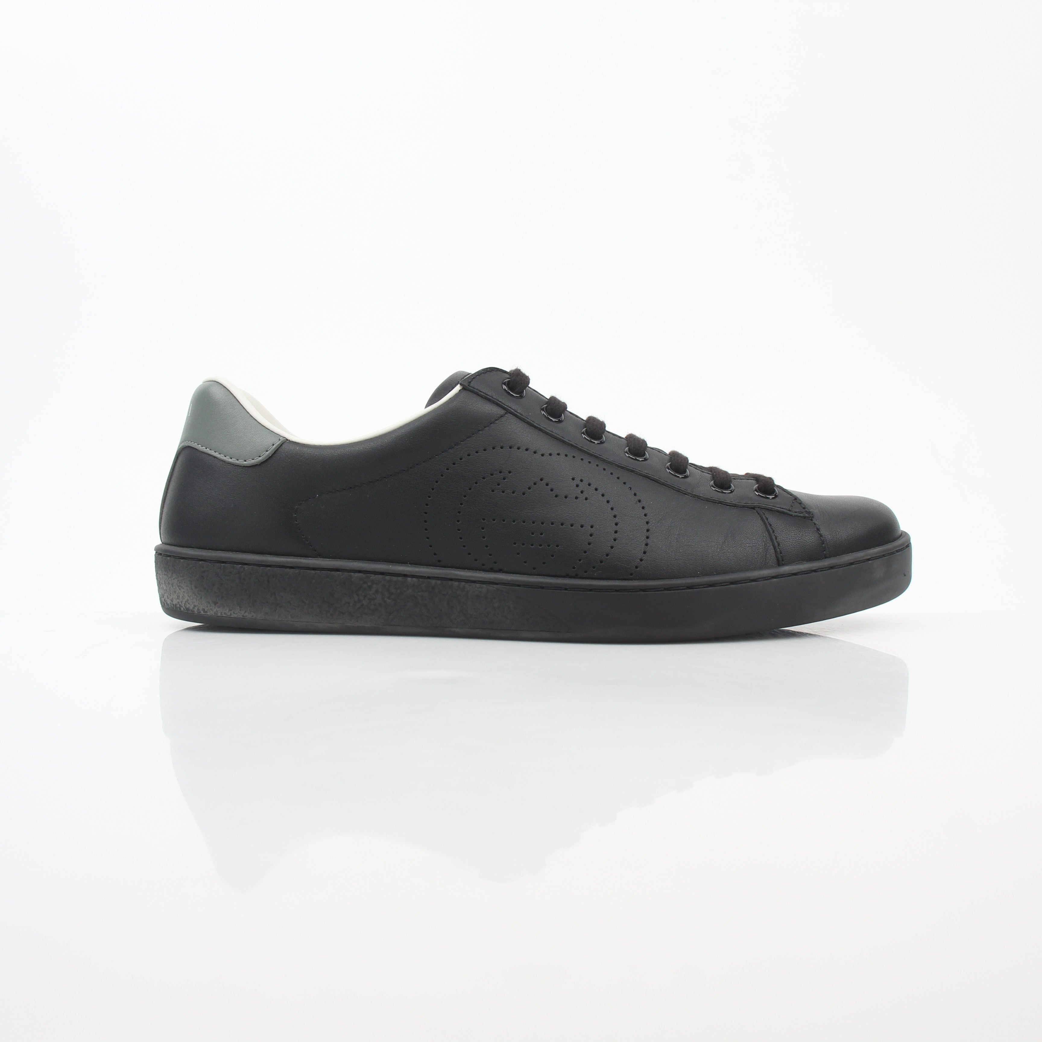 Gucci black leather Brooklyn low-top sneakers with white sole, casual shoes for men by Gold & Beyond.