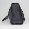 Chanel Deauville Tweed Tote featuring a textured fabric and stylish design, perfect for casual or chic outings.