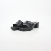 Gucci black rubber platform slide sandals with logo straps, stylish and comfortable shoes for casual wear.