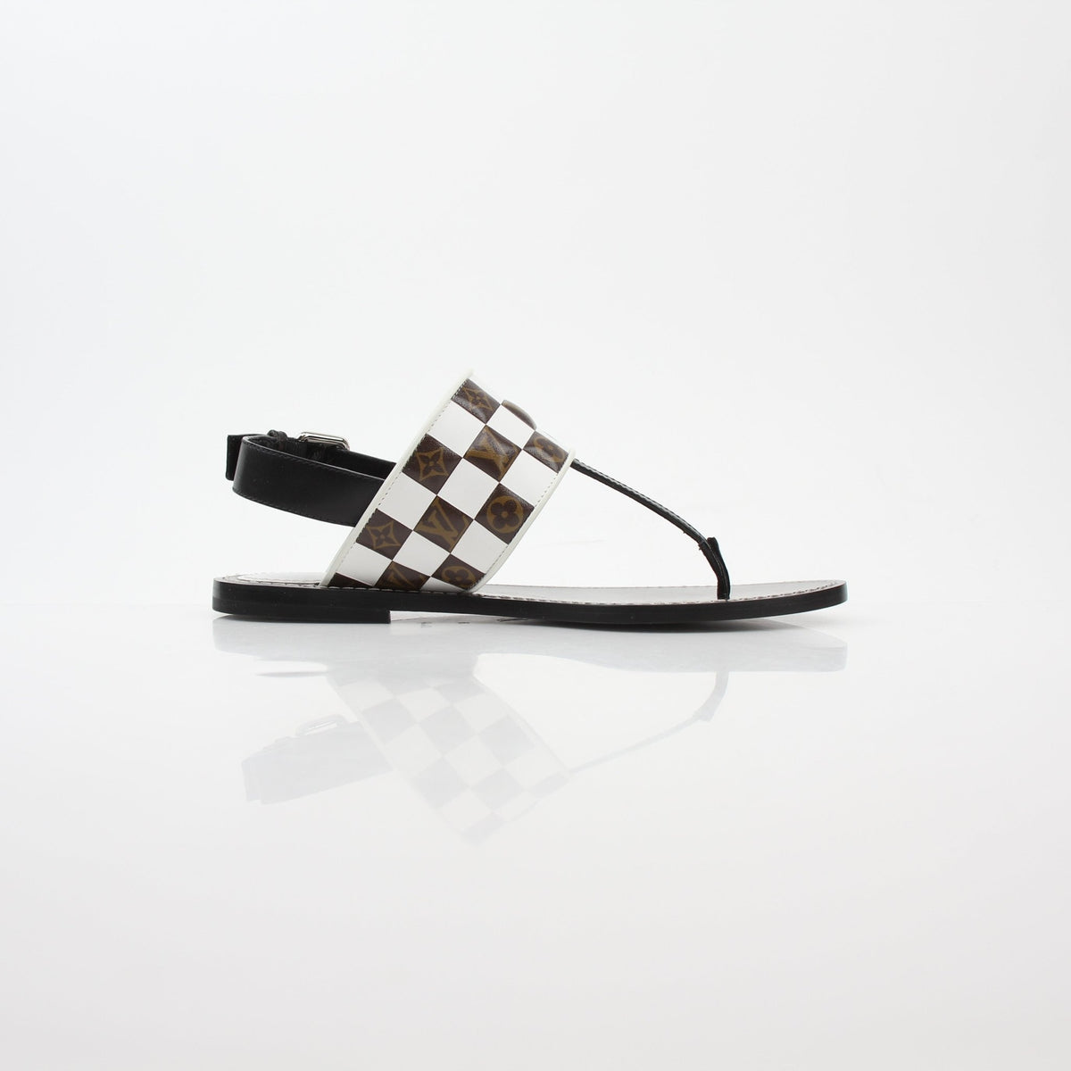 Louis Vuitton black and white monogram matchmake flat thong sandals by Gold & Beyond, featuring a stylish, comfortable sandal design.