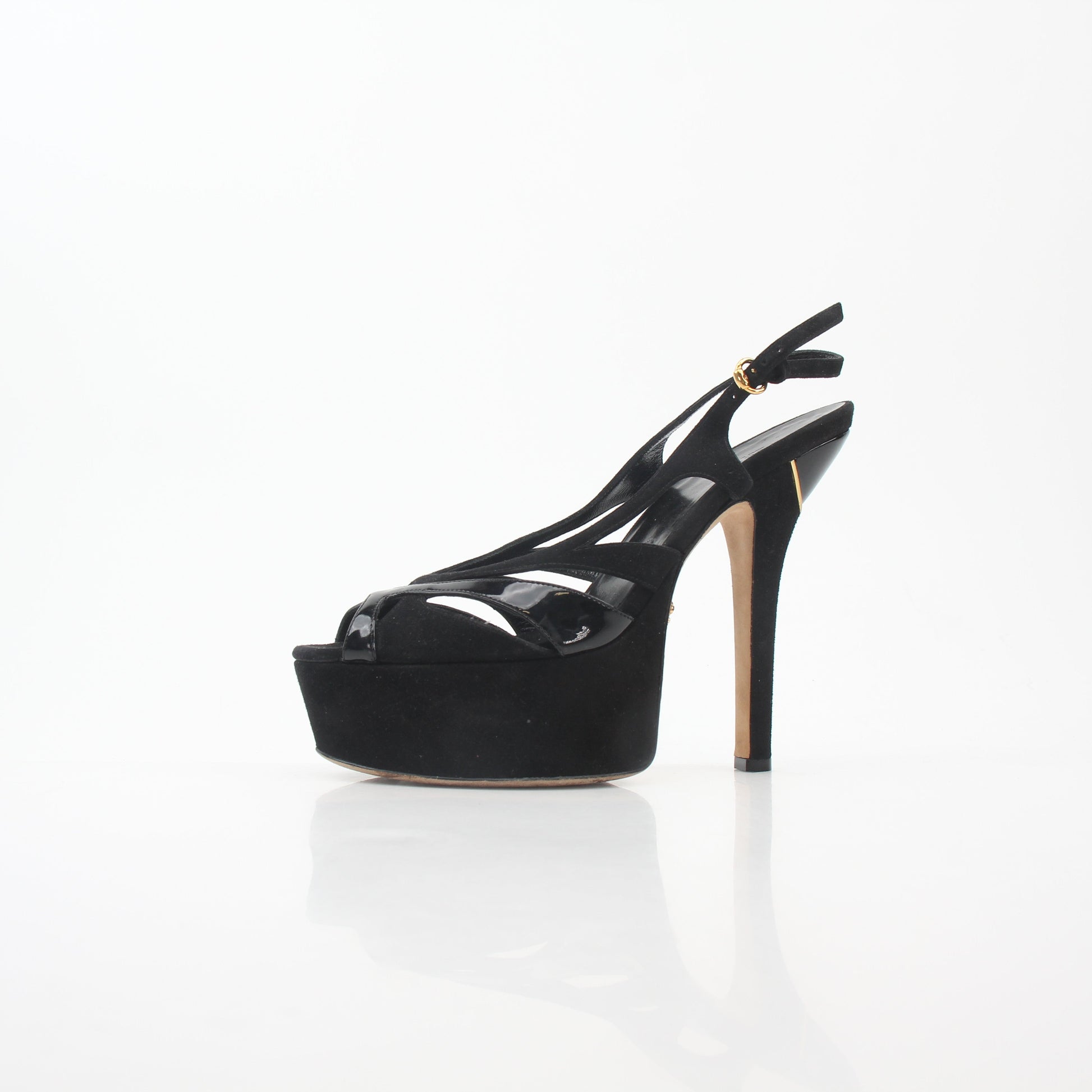 Gucci black suede and patent leather cutout platform slingback heels, showcasing sleek design and stylish heel detail.