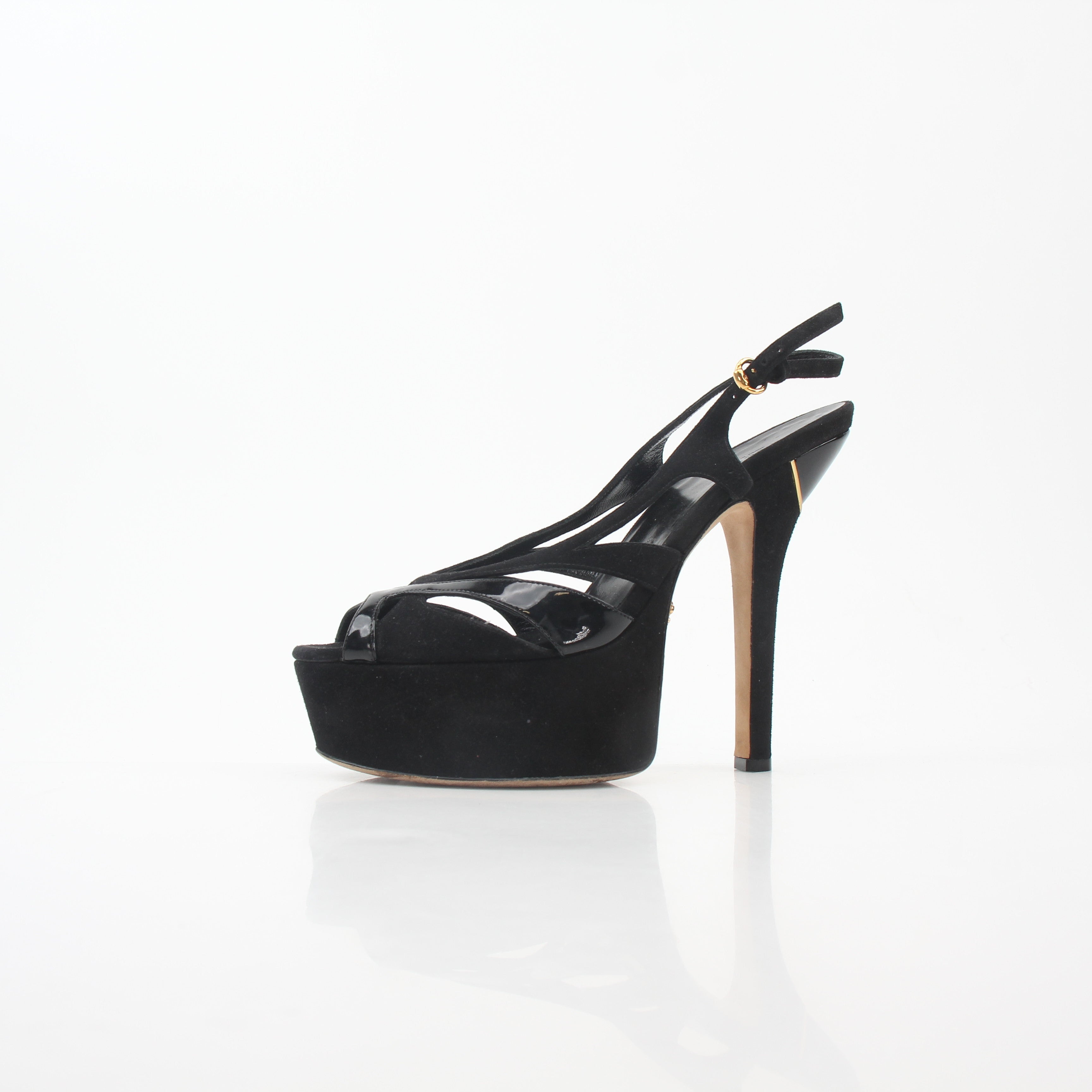 Gucci black suede and patent leather cutout platform slingback heels, showcasing sleek design and stylish heel detail.