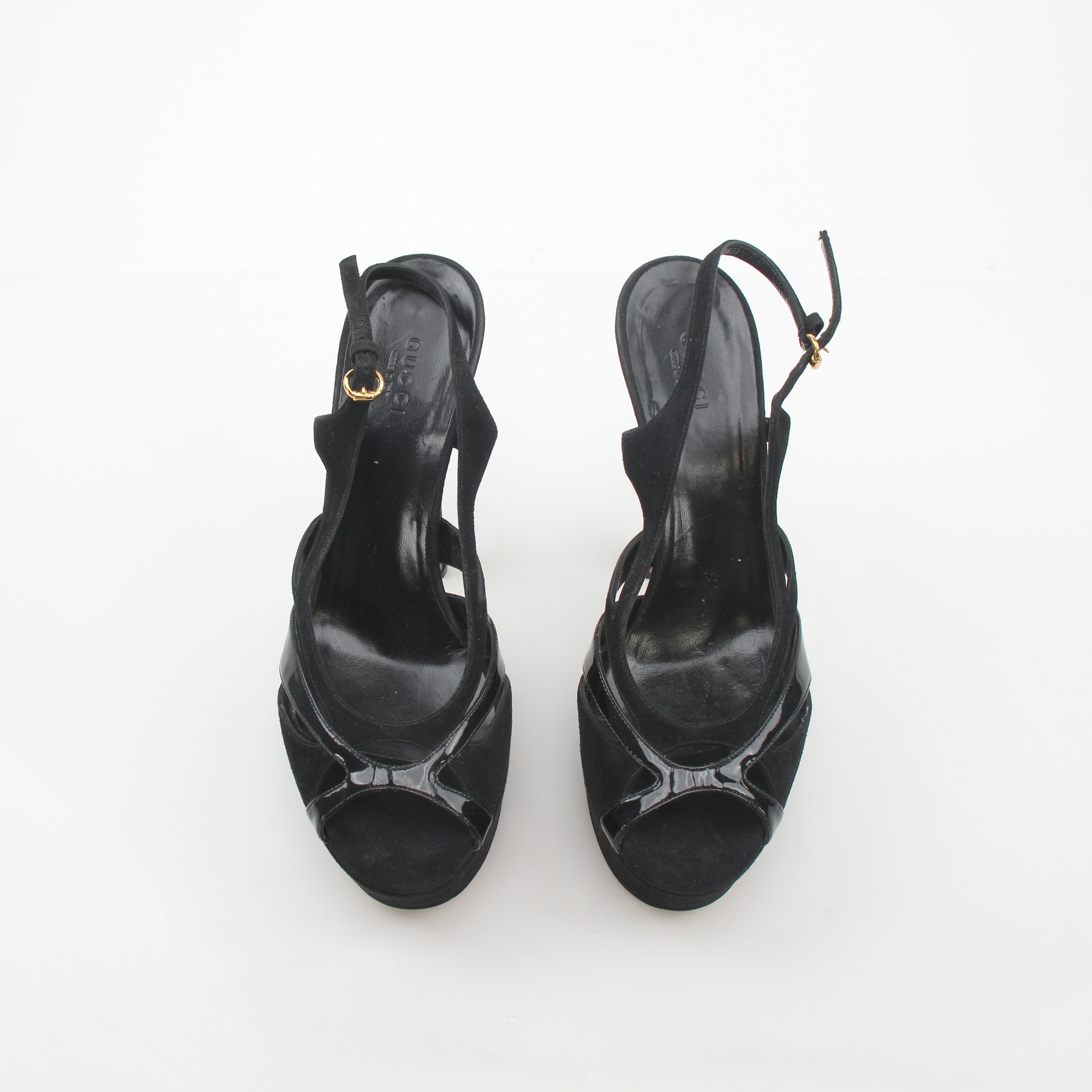 Gucci black suede and patent leather cutout platform slingback heels with chunky heels and ankle straps.