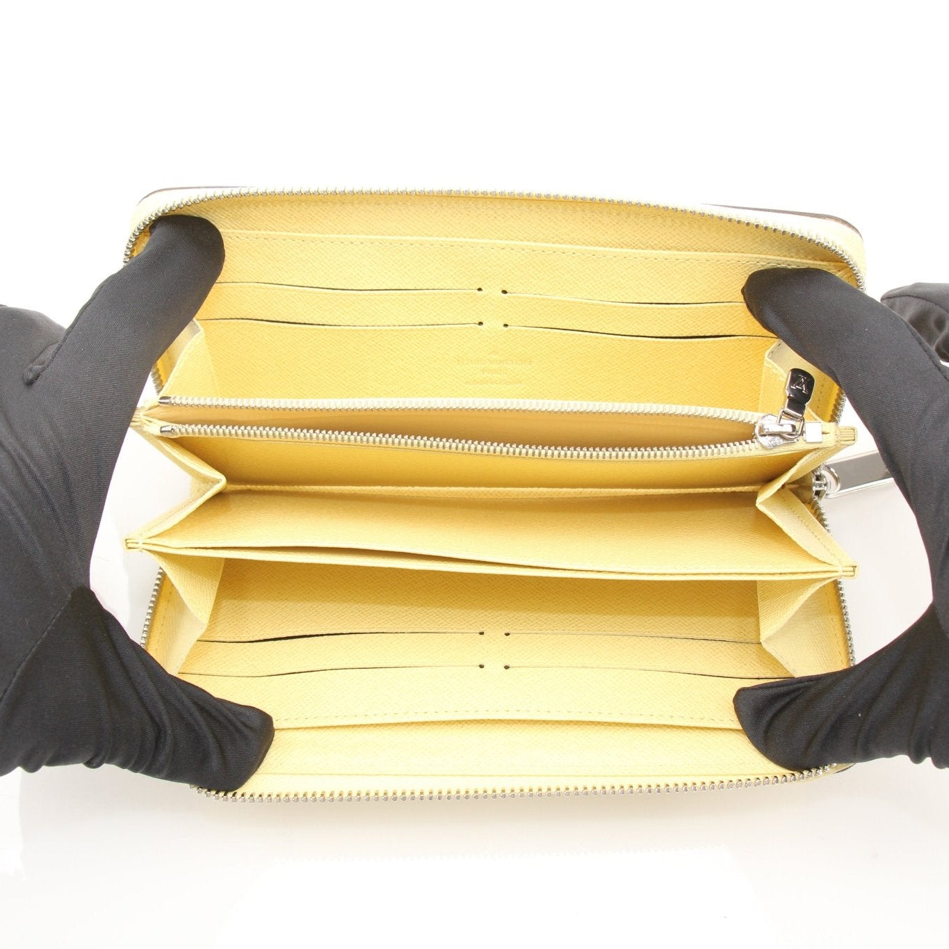 Louis Vuitton Epi Zippy Wallet by Gold & Beyond, featuring textured leather, gold-tone zipper, and compact design.