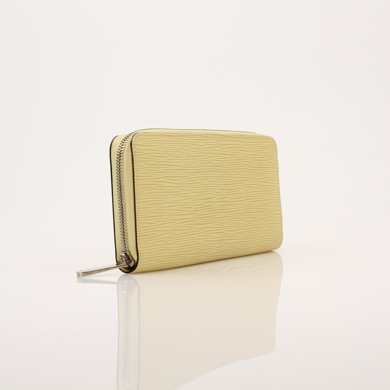 Louis Vuitton Epi Zippy Wallet by Gold & Beyond, featuring textured epi leather and multiple card slots on a sleek wallet.