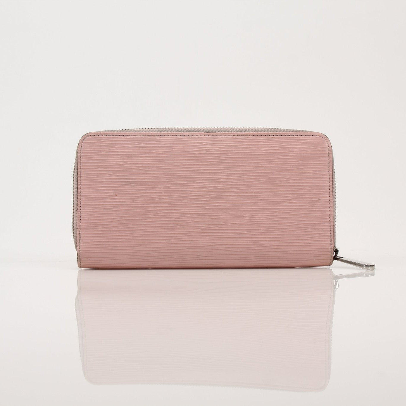 Gold & Beyond Louis Vuitton Epi Zippy Wallet with textured leather, gold accents, and multiple card slots visible in the image.