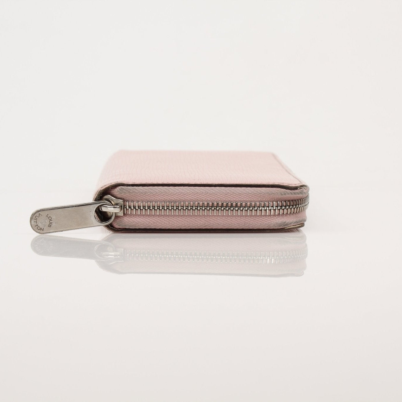 Louis Vuitton Epi Zippy Wallet by Gold & Beyond, showing the textured Epi leather exterior and silver zipper closure.