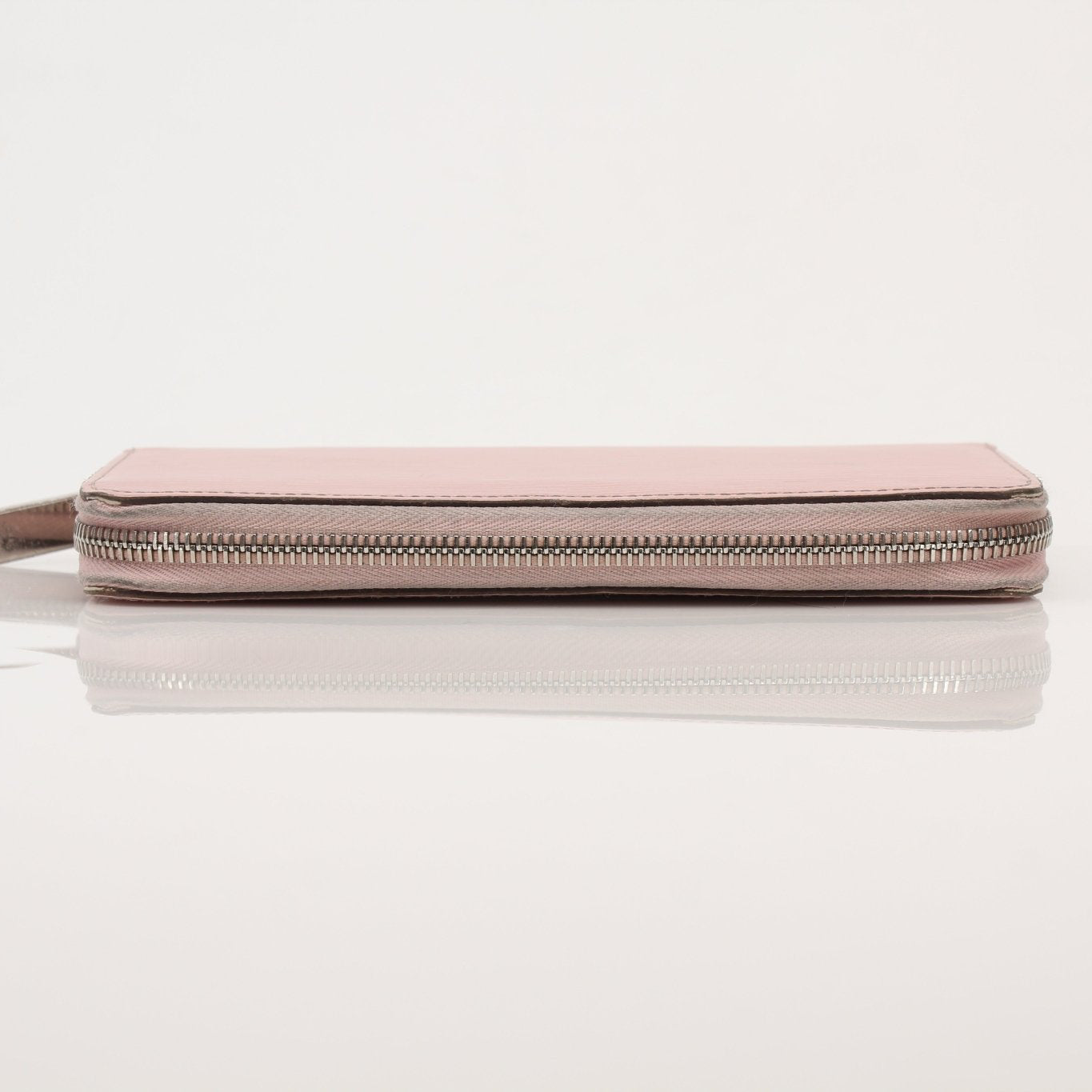 Louis Vuitton Epi Zippy Wallet by Gold & Beyond, featuring textured leather, gold zipper, and compact design for everyday use.