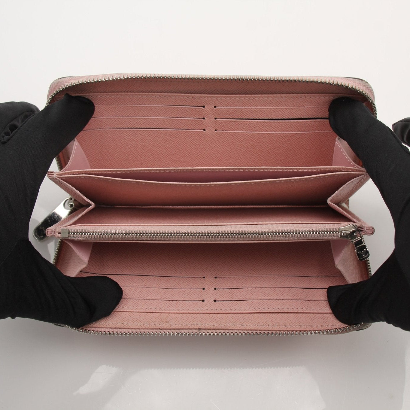Louis Vuitton Epi Zippy Wallet by Gold & Beyond, featuring textured epi leather and multiple card slots on a neutral background.
