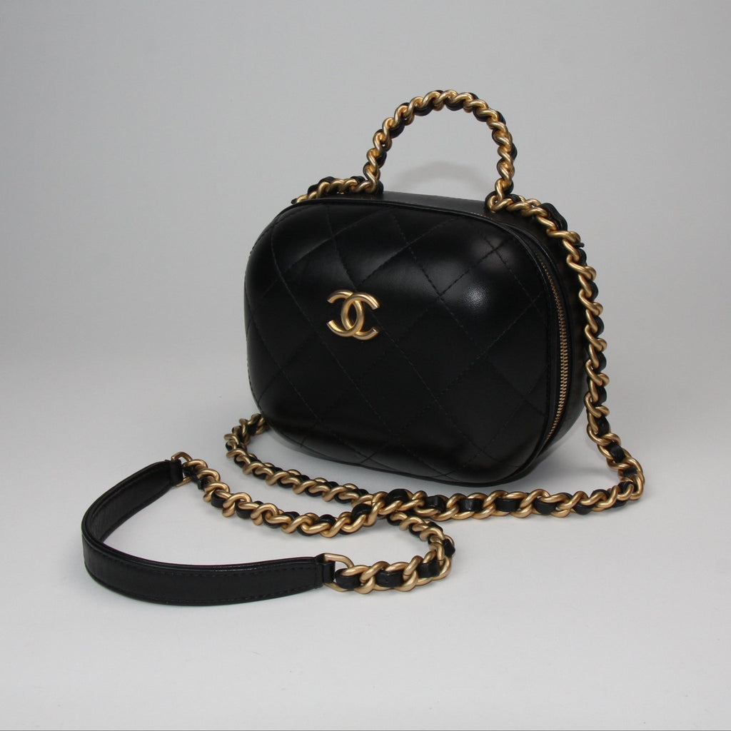 Chanel Matelassé vanity shoulder bag featuring a quilted design and elegant gold hardware on a neutral background.