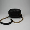 Chanel Matelassé Vanity Shoulder Bag in black leather, featuring quilted design and elegant gold-tone hardware.