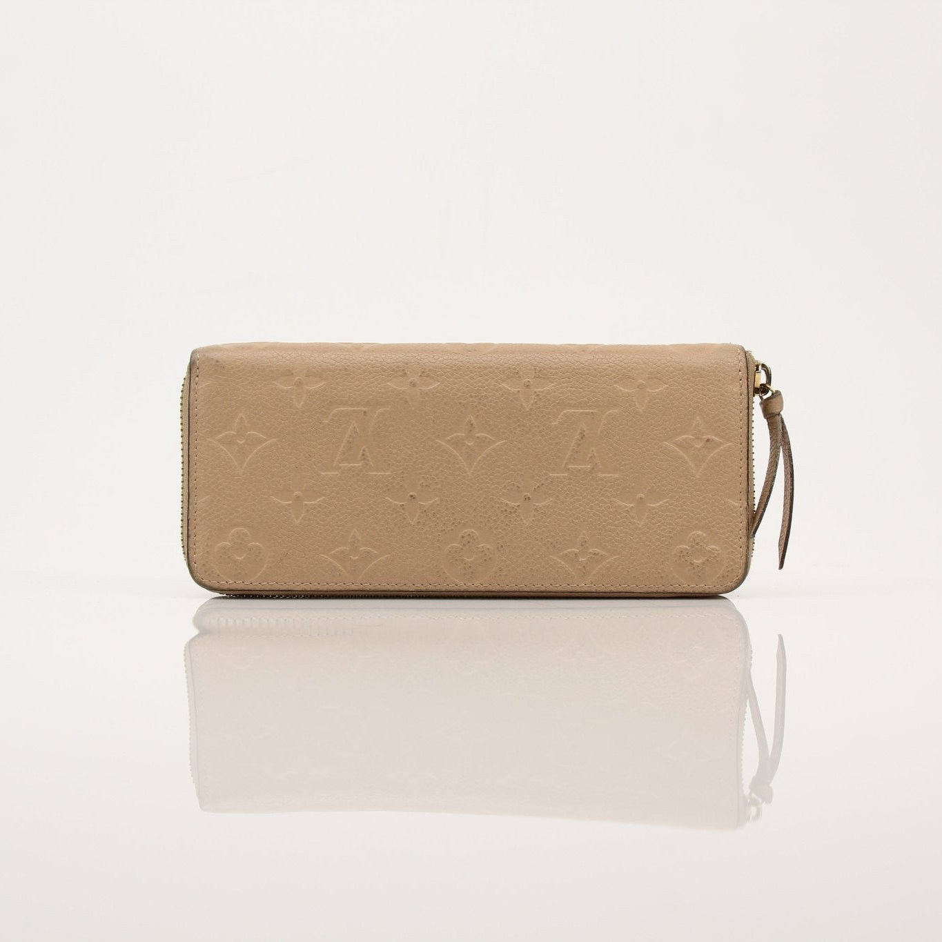 Louis Vuitton Empreinte Clemence wallet with gold hardware, beige textured leather, and multiple card slots.