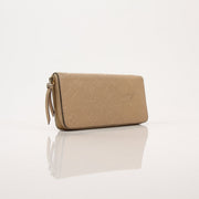 Louis Vuitton Empreinte Clemence wallet with gold hardware, showcasing textured leather and multiple card slots.