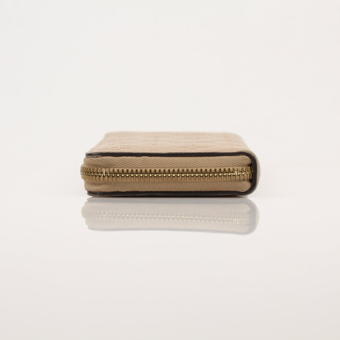 Louis Vuitton Empreinte Clemence wallet with gold-tone hardware and embossed leather, featuring multiple card slots and a zip coin pocket.