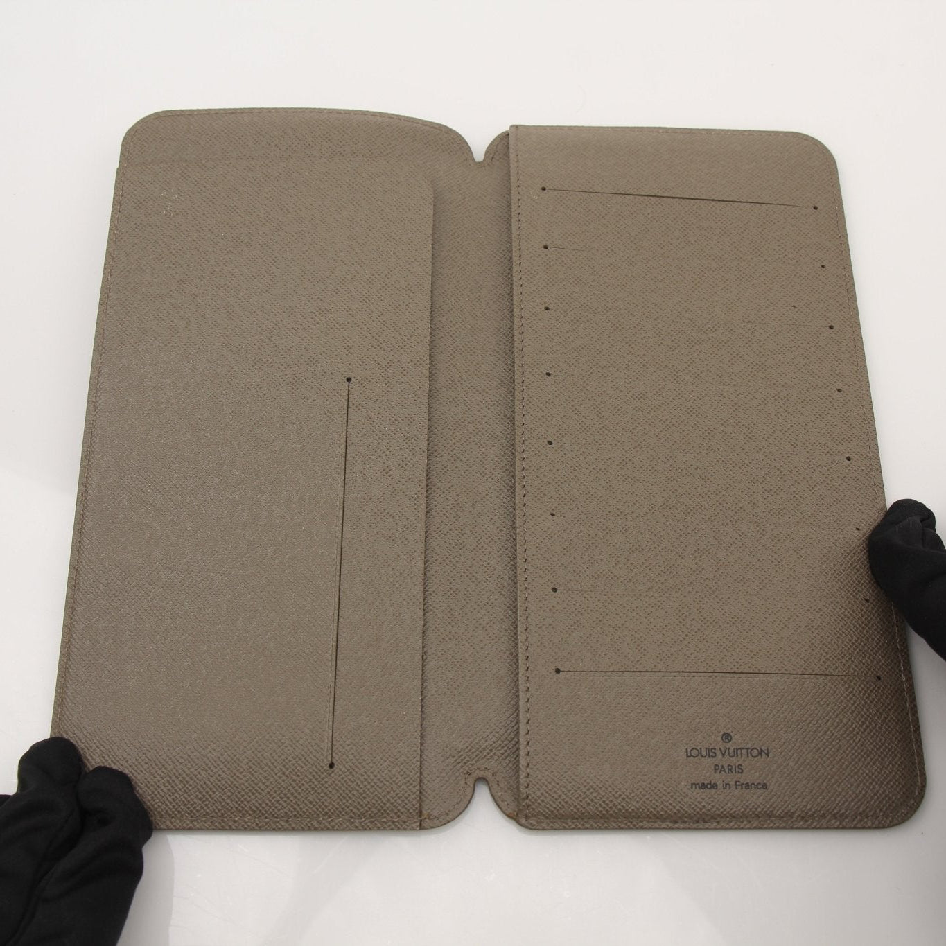 Louis Vuitton Brazza wallet by Gold & Beyond showing the classic monogram canvas with multiple card slots and a sleek design.