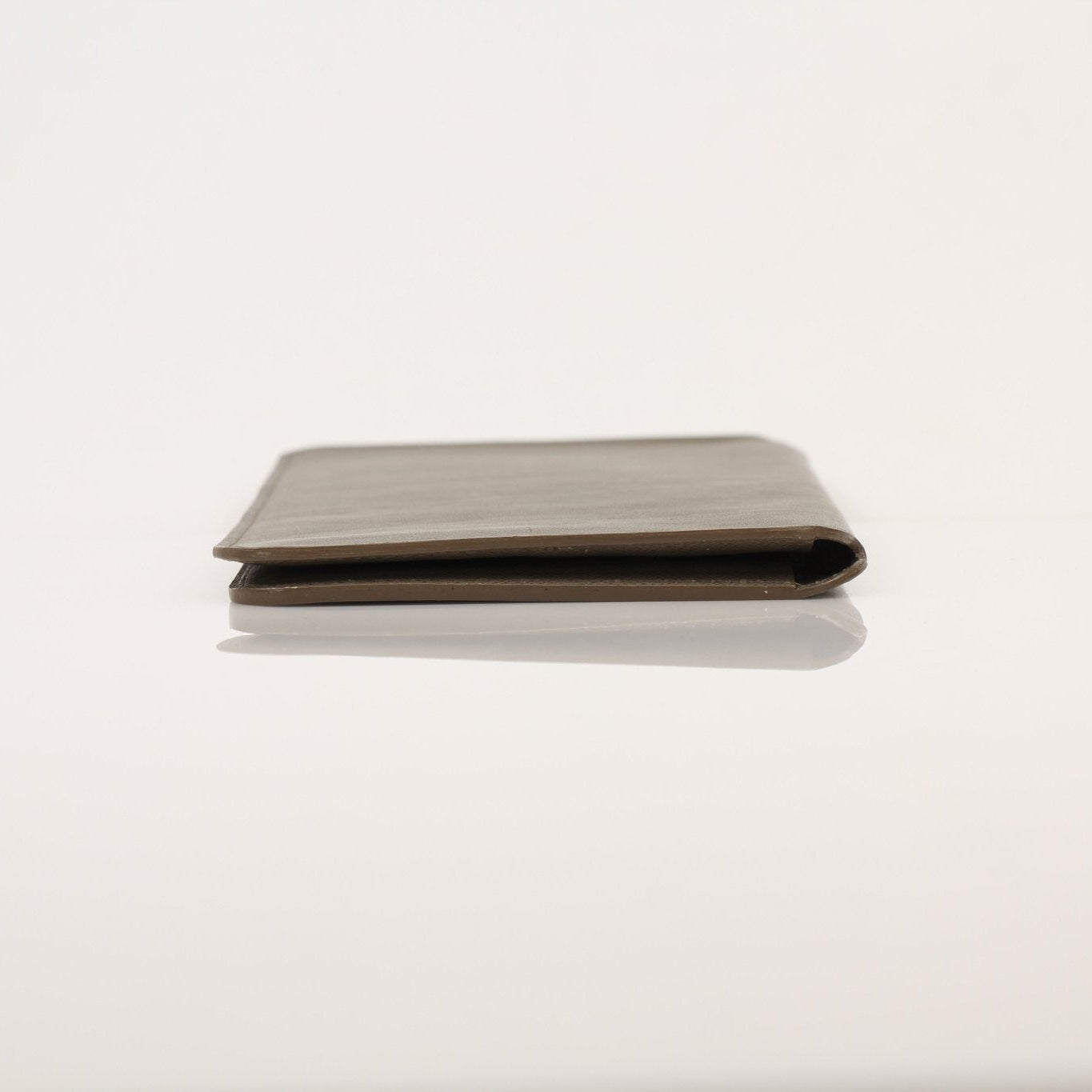 Louis Vuitton Brazza wallet by Gold & Beyond, featuring textured leather and multiple card slots, shown on a white background.