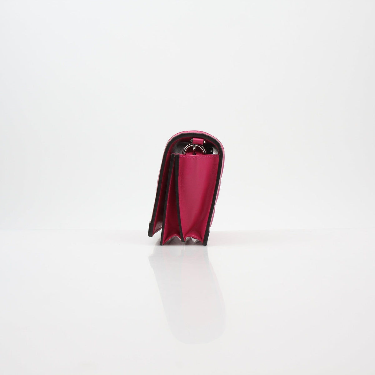 Gucci Fuchsia GG Matelassé Mini Wallet on Chain with gold hardware, showing quilted leather and chain strap detail.