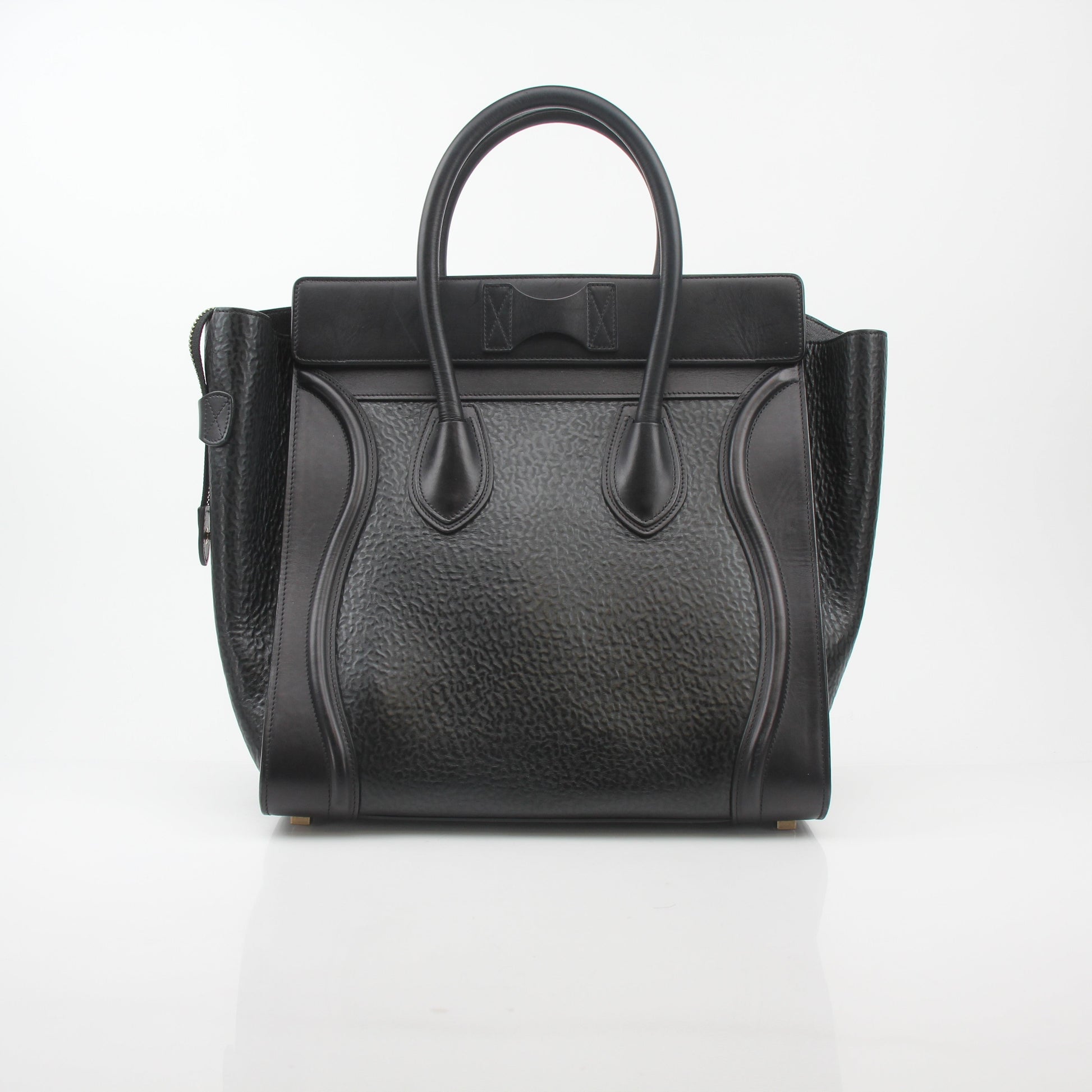 Gold & Beyond Celine black luggage tote handbag with sturdy handles and spacious interior, stylish travel accessory.