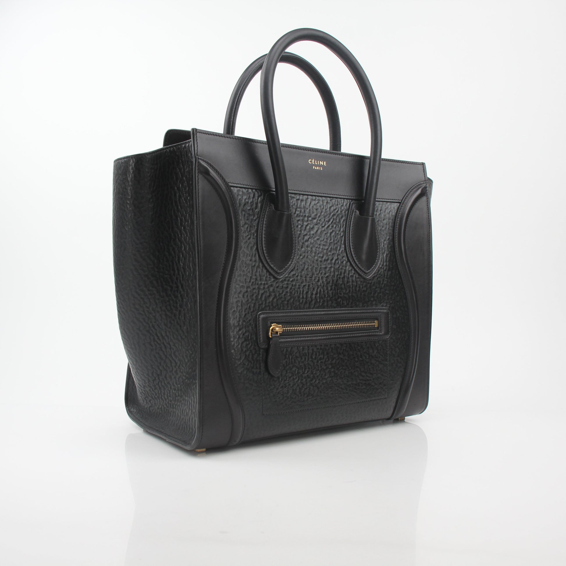 Gold & Beyond Celine black luggage tote handbag with sturdy handles and spacious interior, stylish and functional for everyday use.