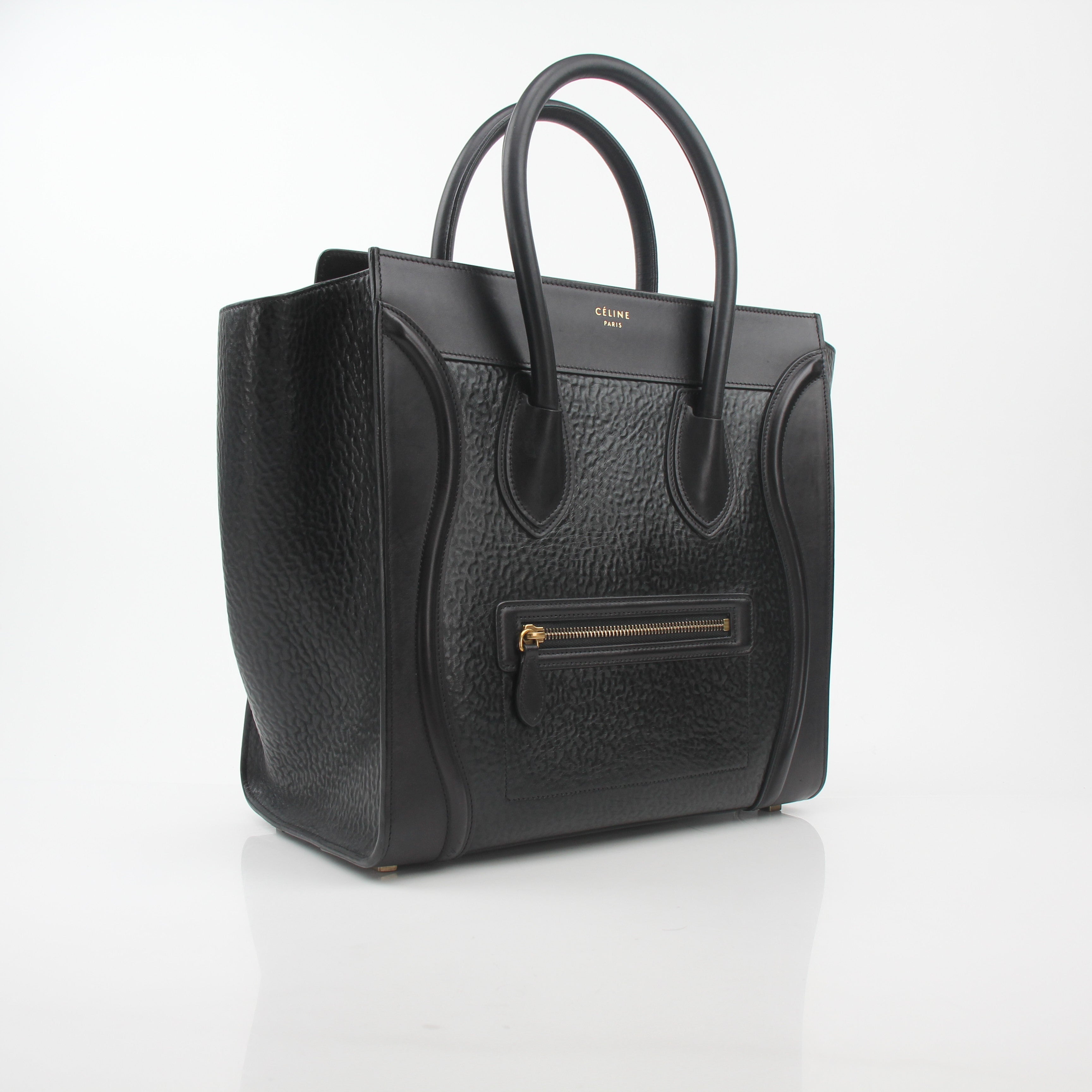 Gold & Beyond Celine black luggage tote handbag with sturdy handles and spacious interior, stylish and functional for everyday use.