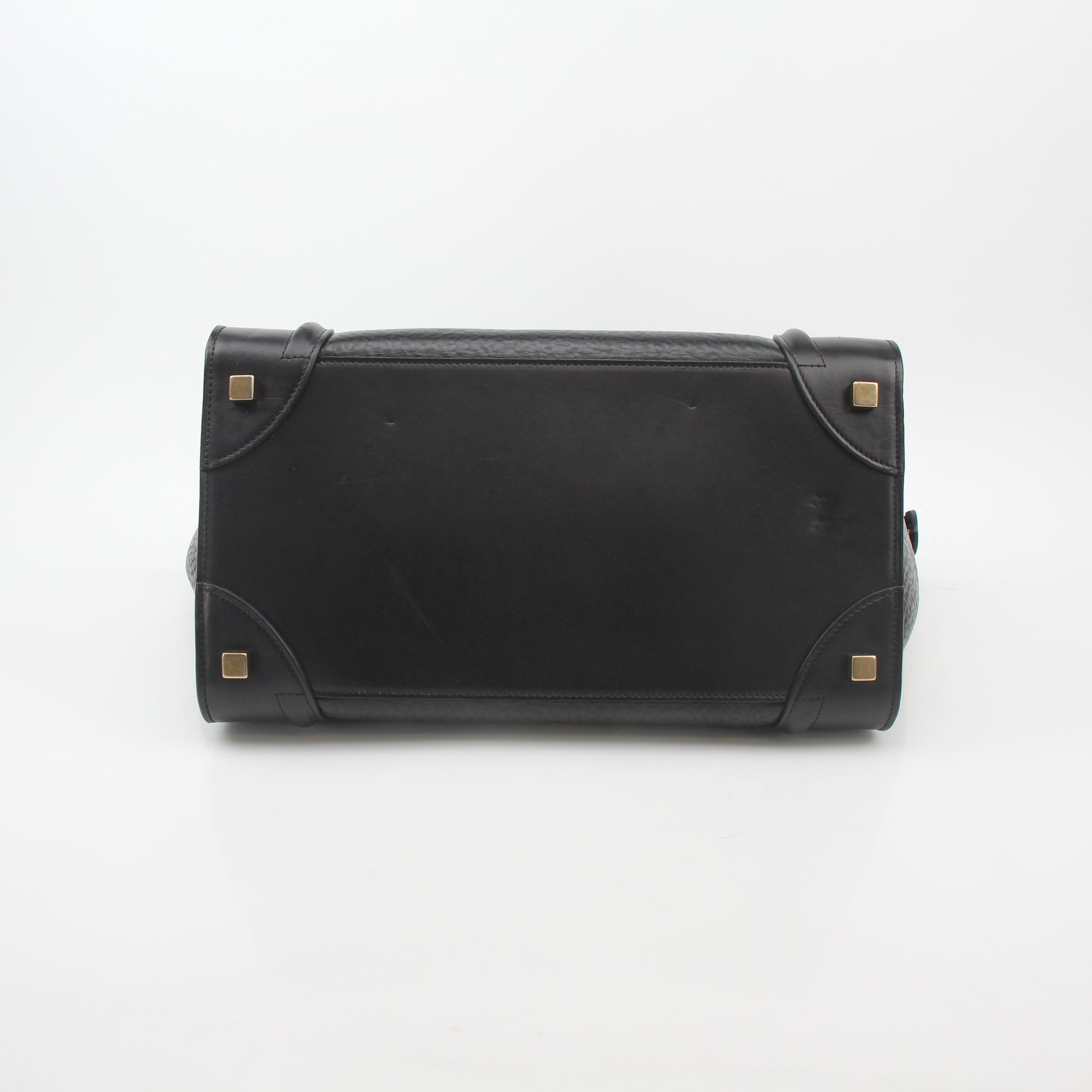 Black Celine luggage tote handbag by Gold & Beyond with top handles and structured design, shown on white background.