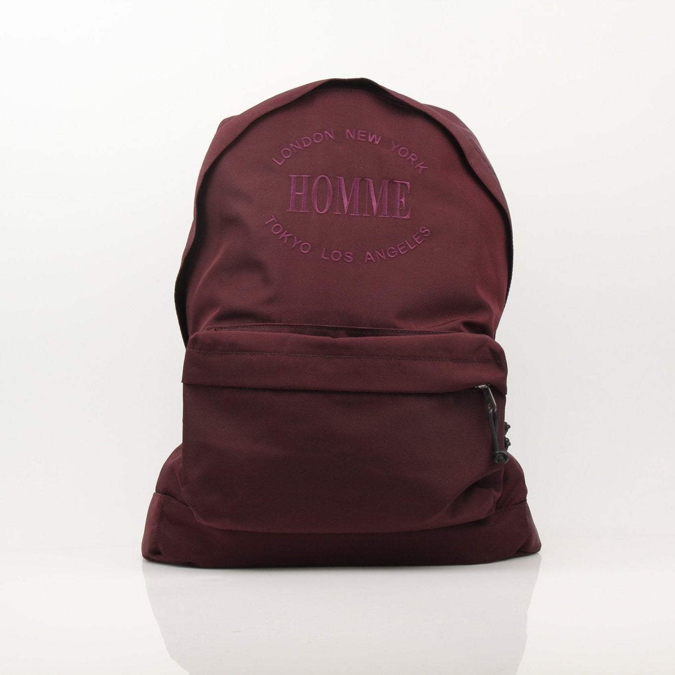 Gold & Beyond nylon explorer backpack with multiple compartments, adjustable straps, and durable design for travel and everyday use.