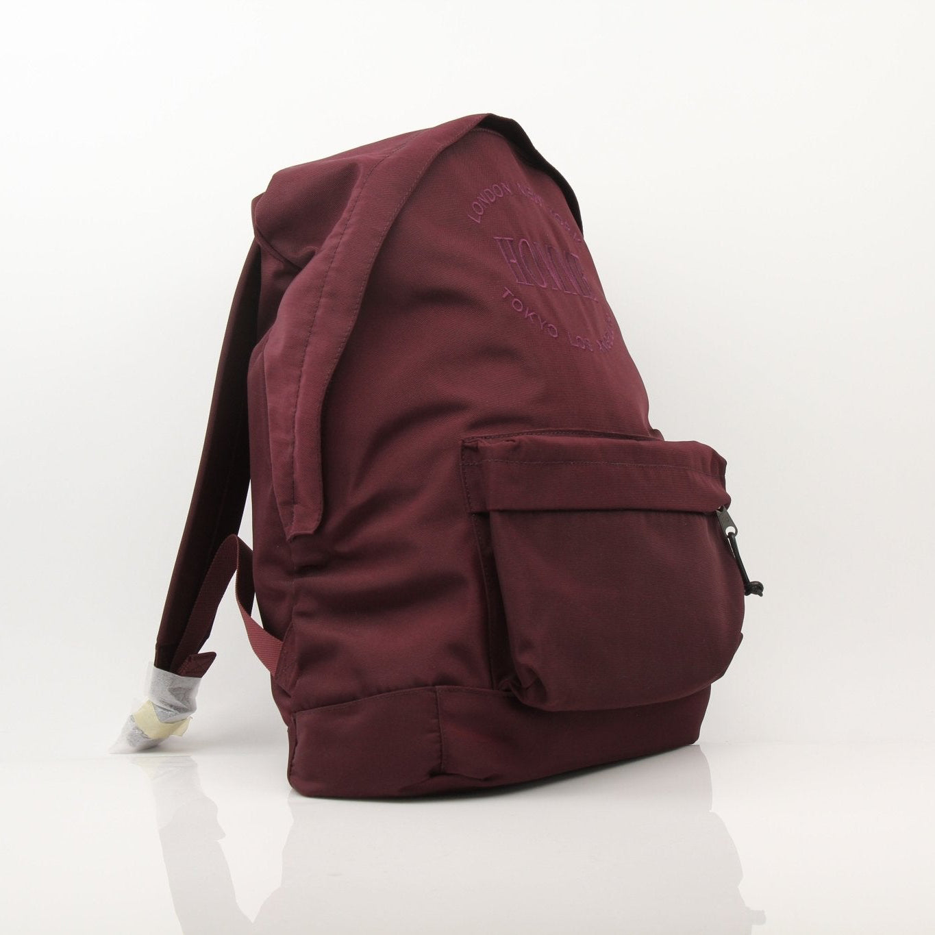 Gold & Beyond nylon Explorer backpack with adjustable straps, multiple compartments, and sleek black design for travel and daily use.