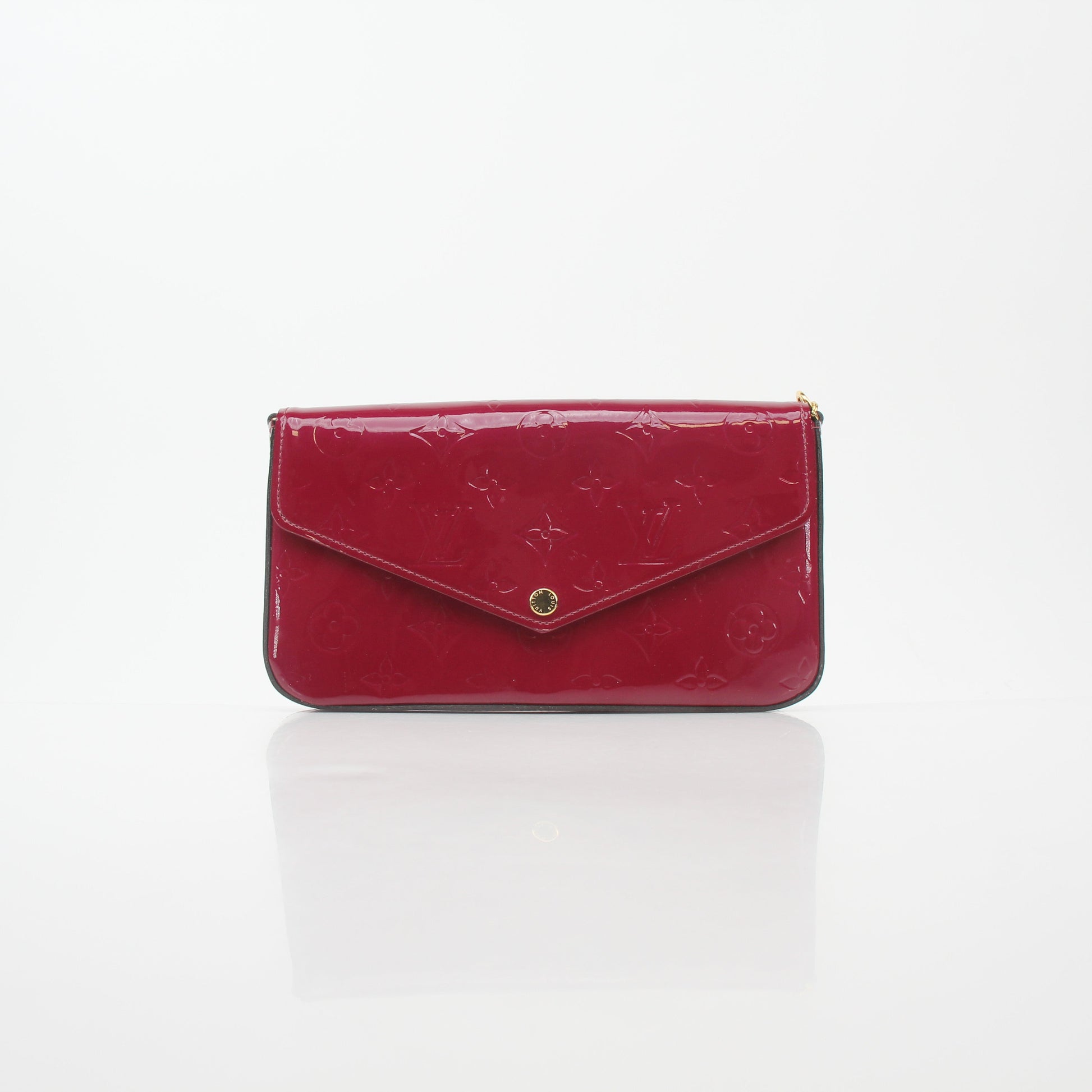Louis Vuitton Red Monogram Vernis Pochette Félicie handbag with gold hardware and glossy finish, displayed on a neutral background.