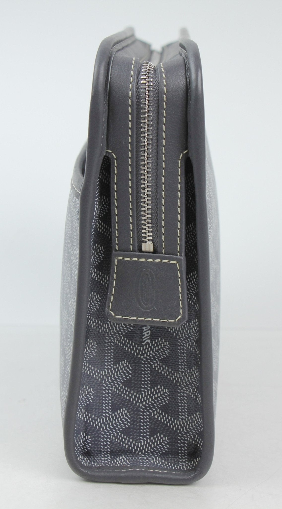 Goyard Jouvence PM toiletry pouch in toile pattern, compact travel bag with leather trim, from Gold & Beyond.