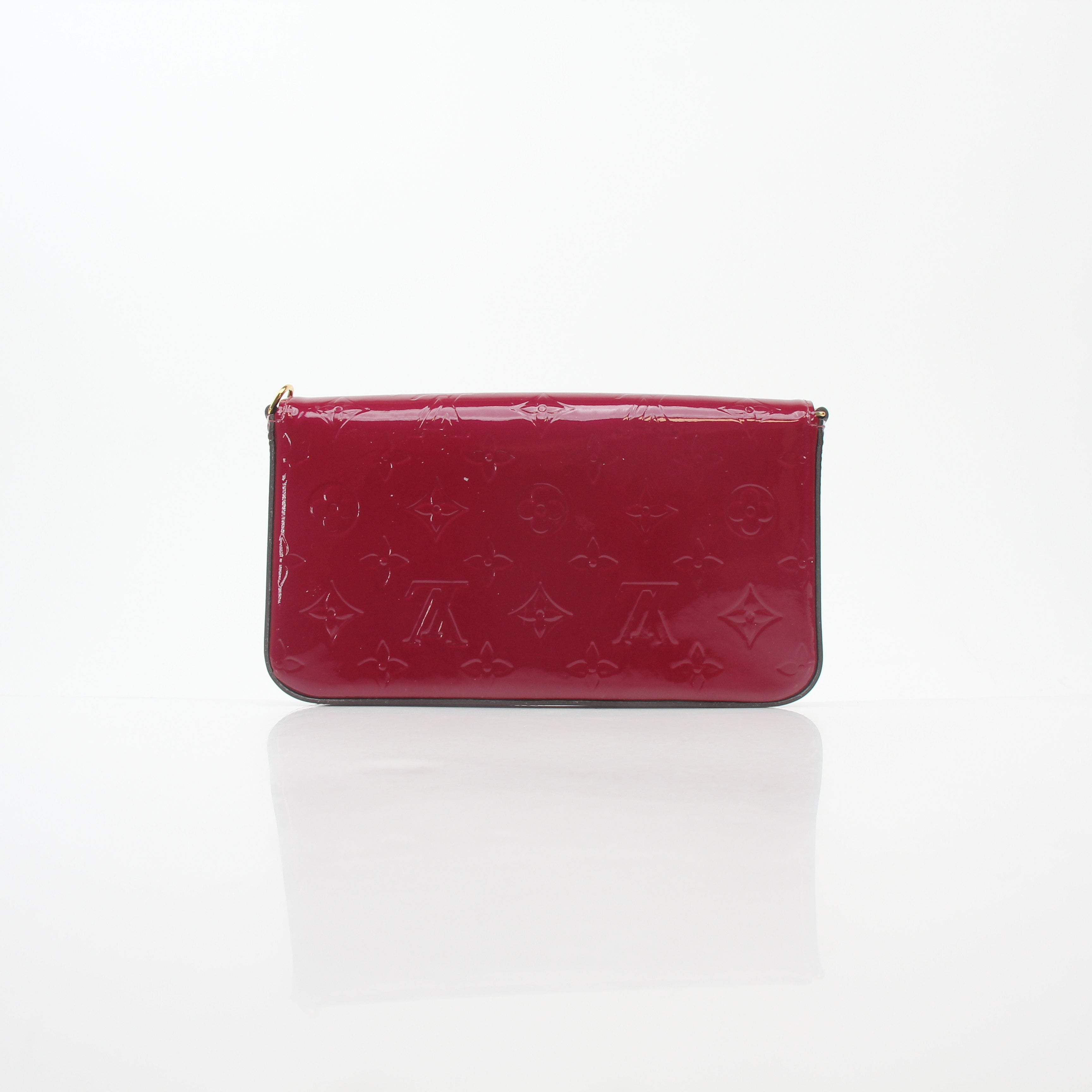 Louis Vuitton Red Monogram Vernis Pochette Félicie handbag with gold hardware and compact design, featuring signature monogram pattern.