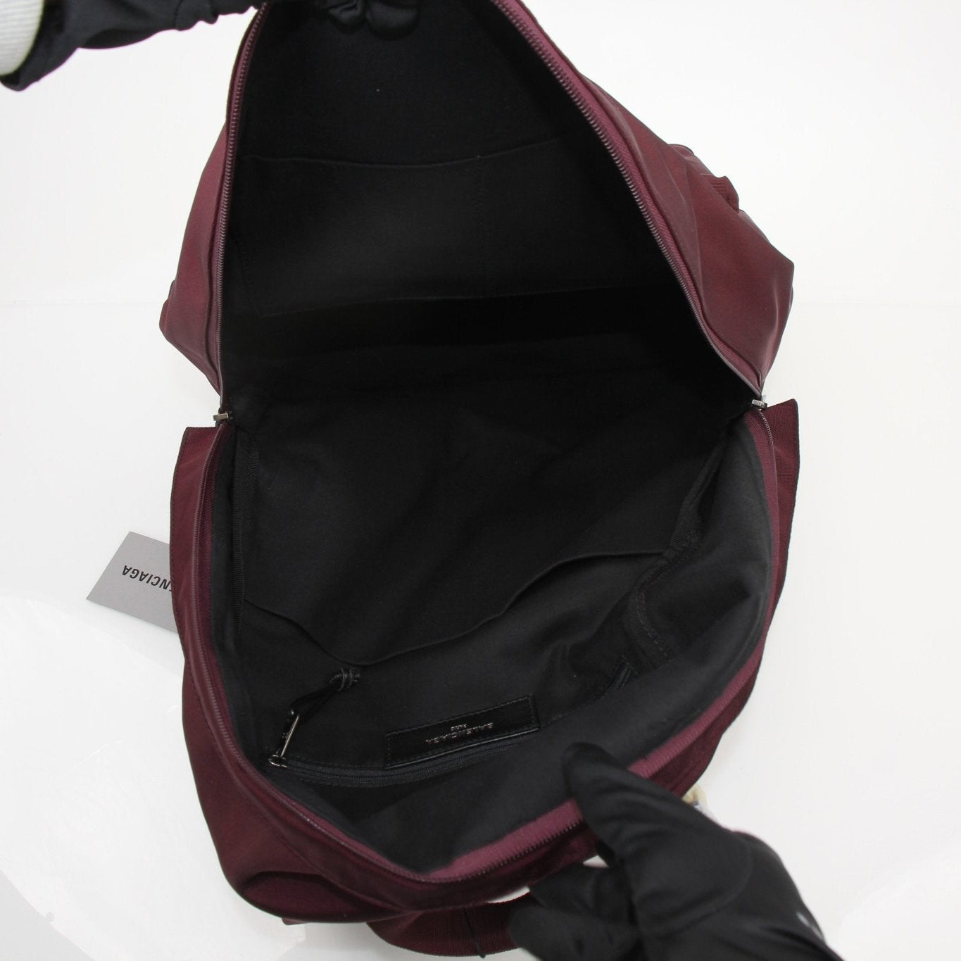 Balenciaga Nylon Explorer Backpack featuring a sleek black nylon design with adjustable straps and multiple compartments.