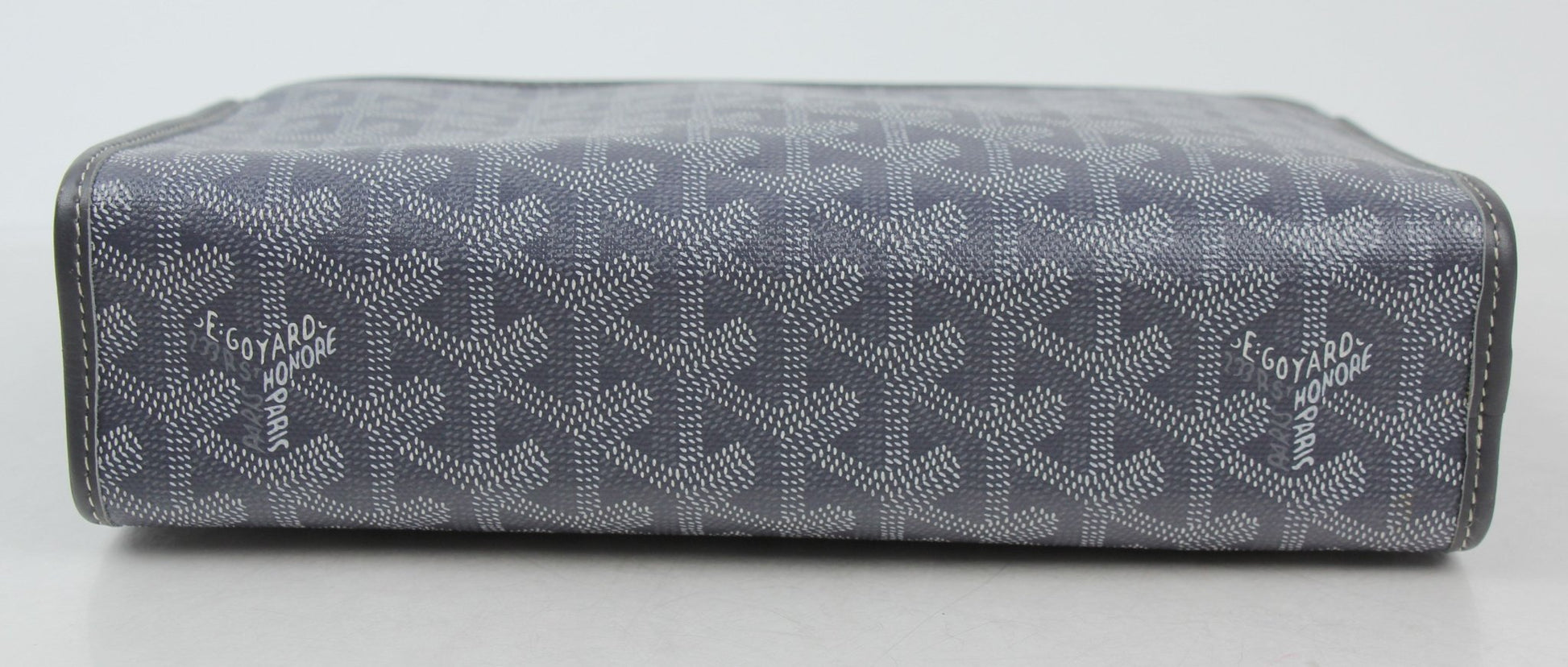 Gold & Beyond Goyard Jouvence PM Toiletry Pouch in classic patterned fabric, compact travel bag with zipper closure.