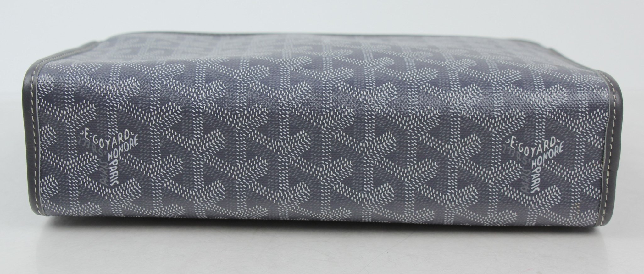Gold & Beyond Goyard Jouvence PM Toiletry Pouch in classic patterned fabric, compact travel bag with zipper closure.