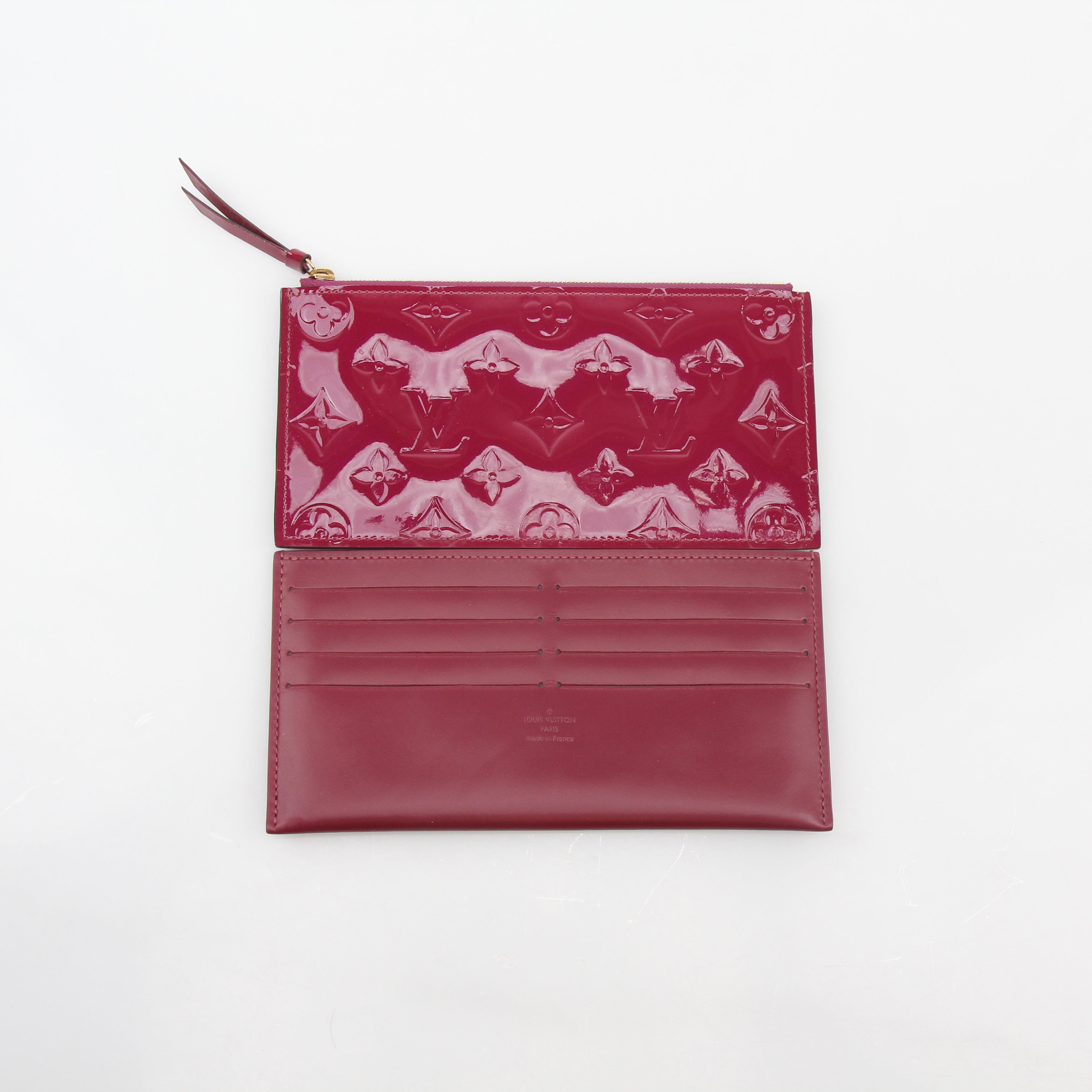 Louis Vuitton Red Monogram Vernis Pochette Félicie handbag with gold hardware, featuring the signature monogram pattern and glossy finish.
