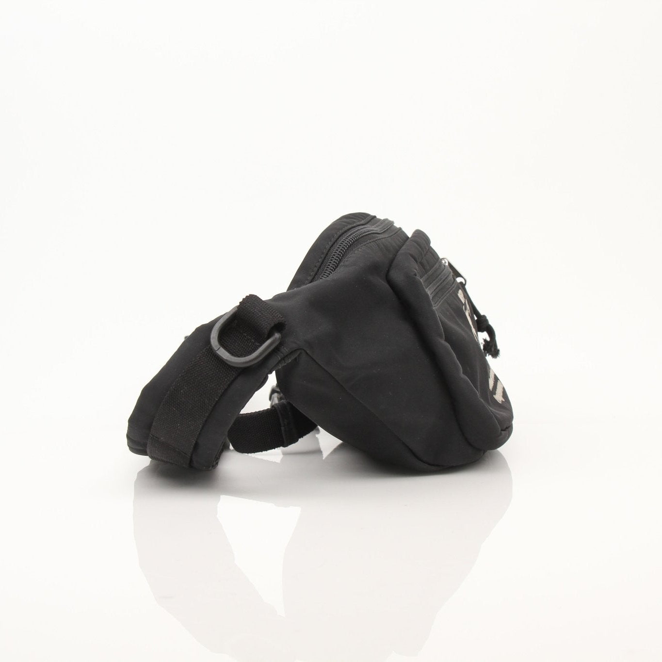Gold & Beyond Balenciaga WFP nylon belt bag with adjustable strap and sleek design, shown in a close-up shot.