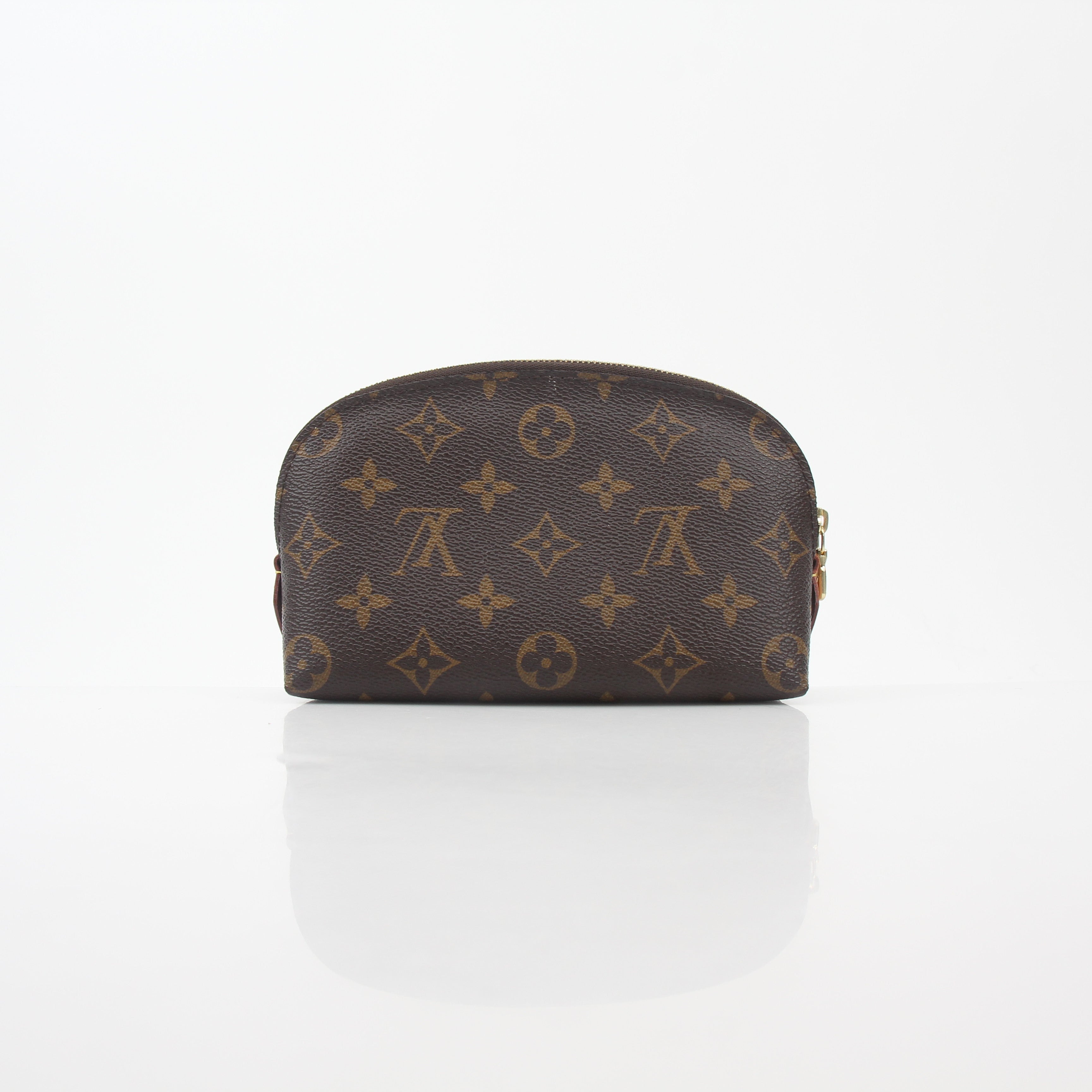 Louis Vuitton Monogram cosmetic pouch by Gold & Beyond, a stylish vanity case with iconic monogram design and compact storage.