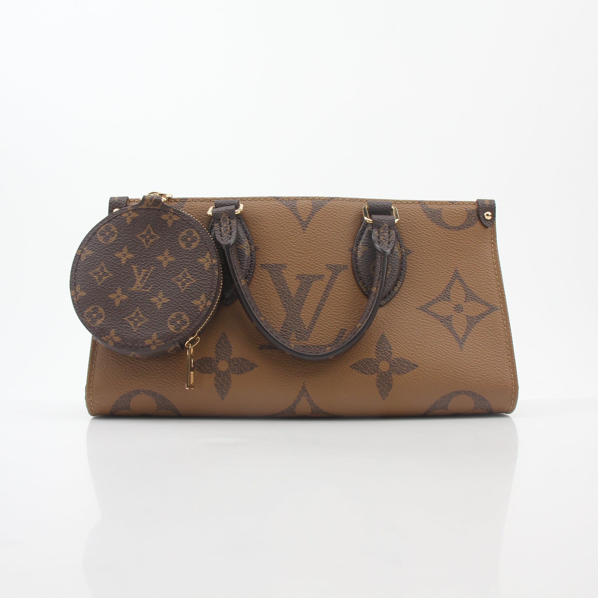 Louis Vuitton Brown Monogram OnTheGo East West handbag with gold-tone hardware and double top handles, displayed against a neutral background.