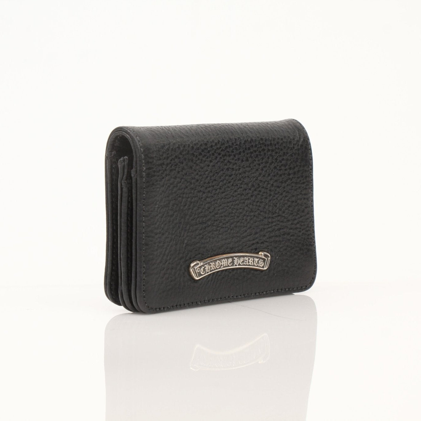 Chrome Hearts leather card wallet with chrome hardware and embossed logo, featuring multiple card slots and compact design.