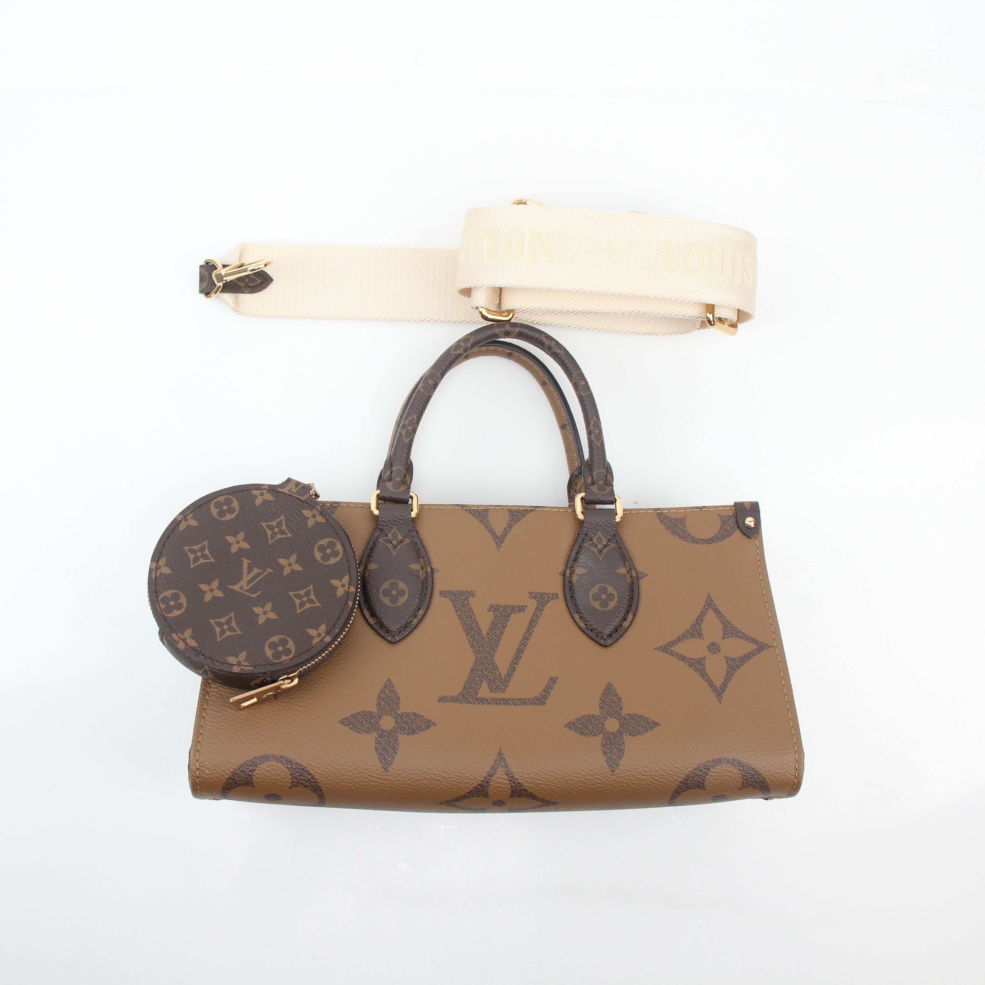 Louis Vuitton Brown Monogram OnTheGo East West handbag with gold accents, featuring a spacious design and structured silhouette.