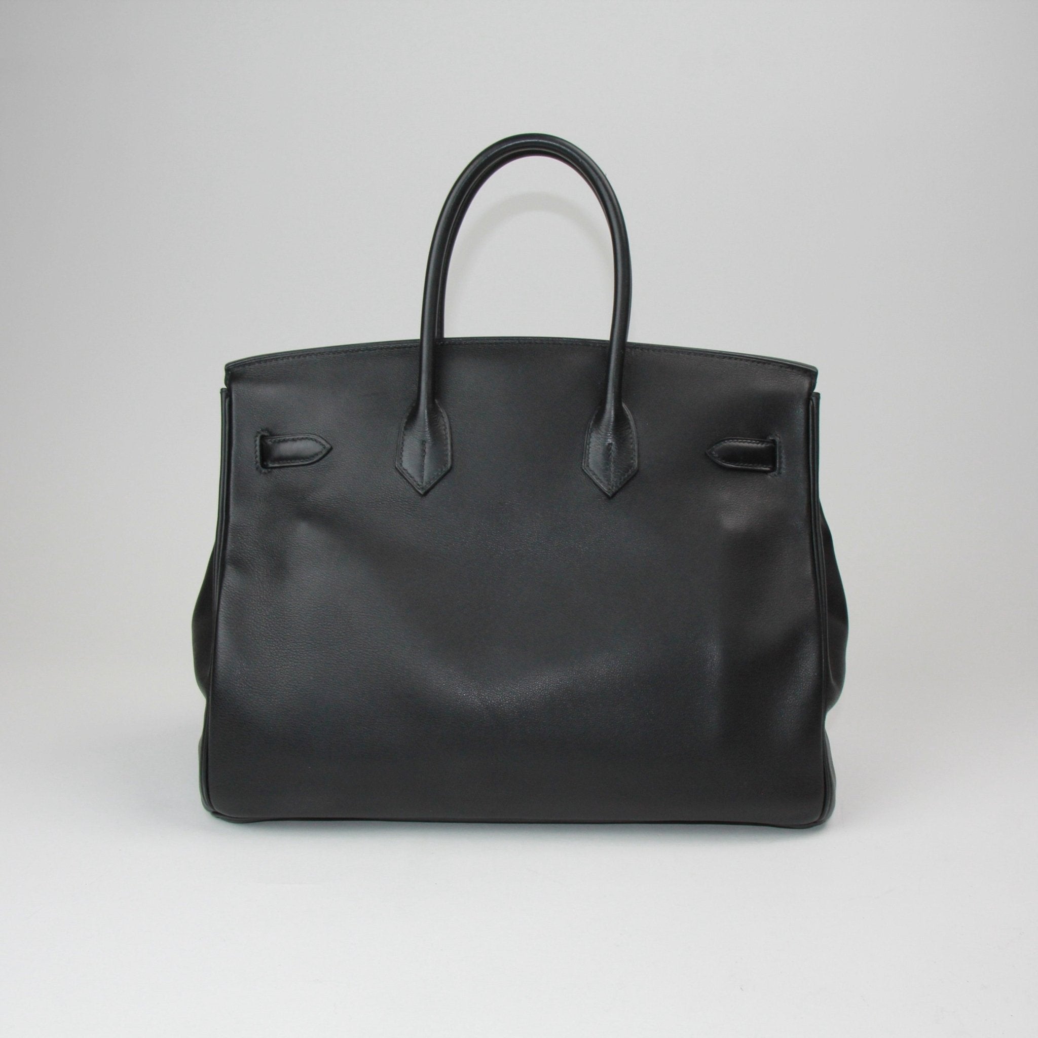 Gold & Beyond Hermès Birkin 35 handbag in classic design, showcasing premium leather and elegant hardware.