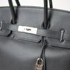 Hermès Birkin 35 handbag in elegant design, featuring gold accents and premium leather craftsmanship.