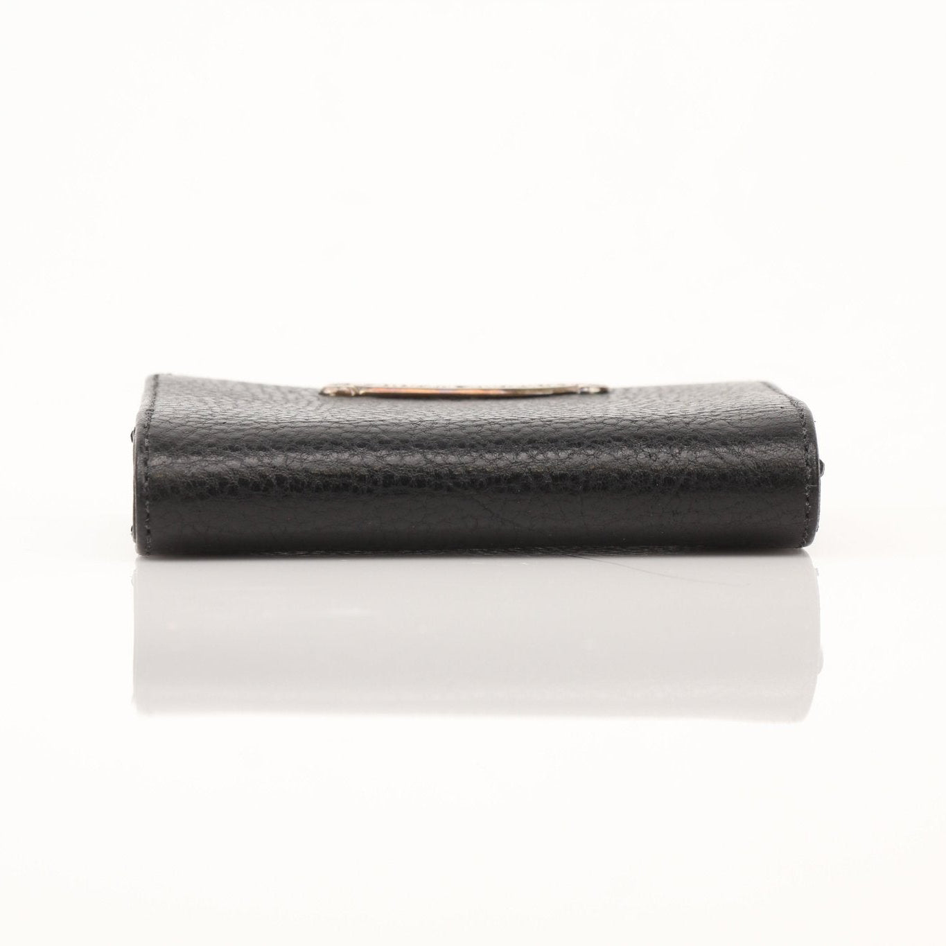 Chrome Hearts leather card wallet featuring silver hardware and branded details, compact and stylish for everyday use.